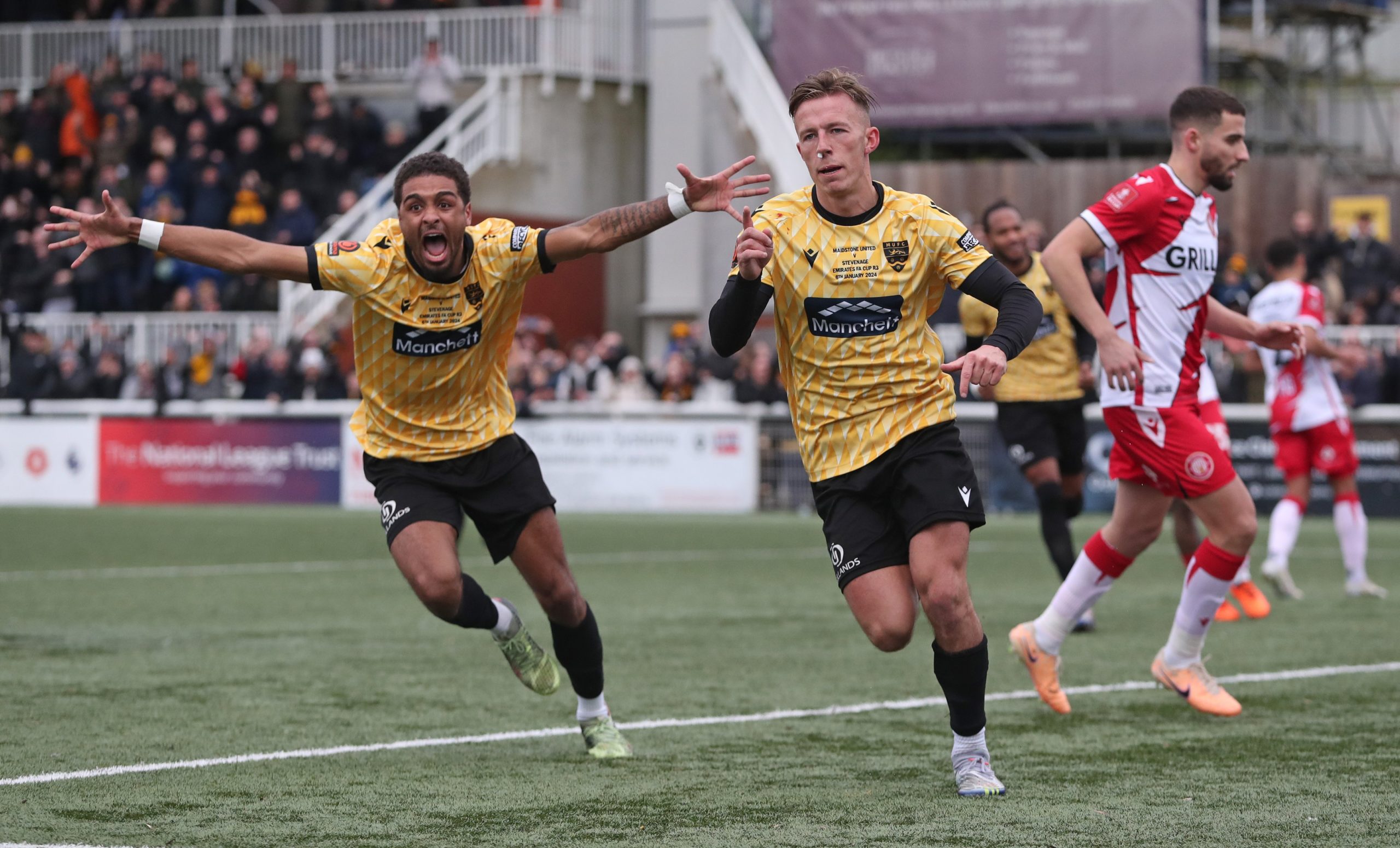 Sam Corne of Maidstone United celebrates scoring