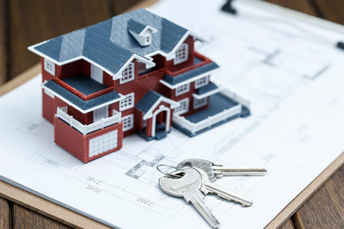 small house model and house keys