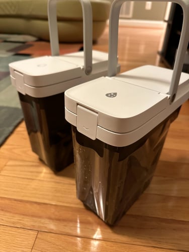 The vacuum's two water tanks &mdash;&nbsp;one for dirty water and one for clean water