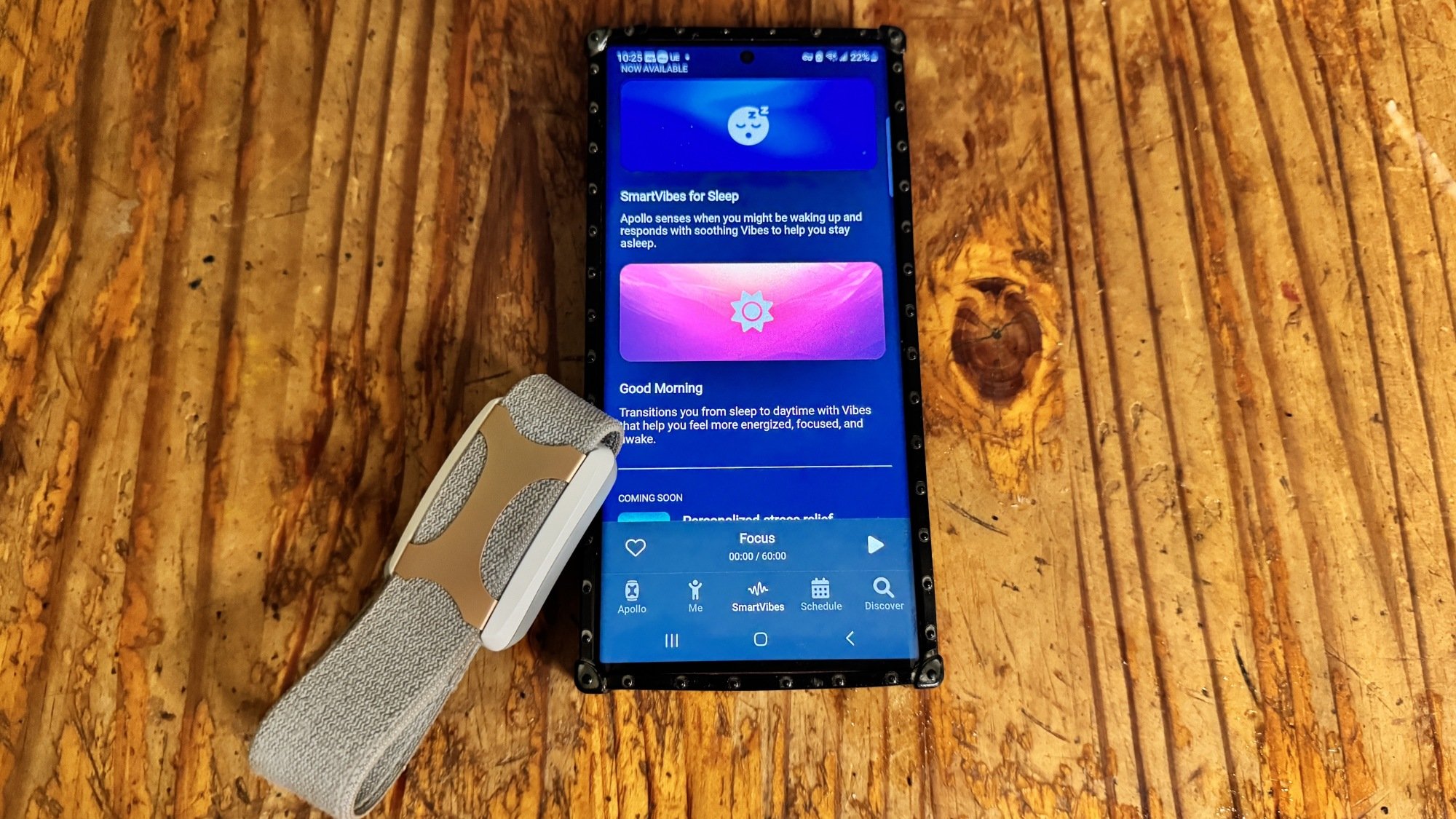 Apollo Neuro and companion app on a table
