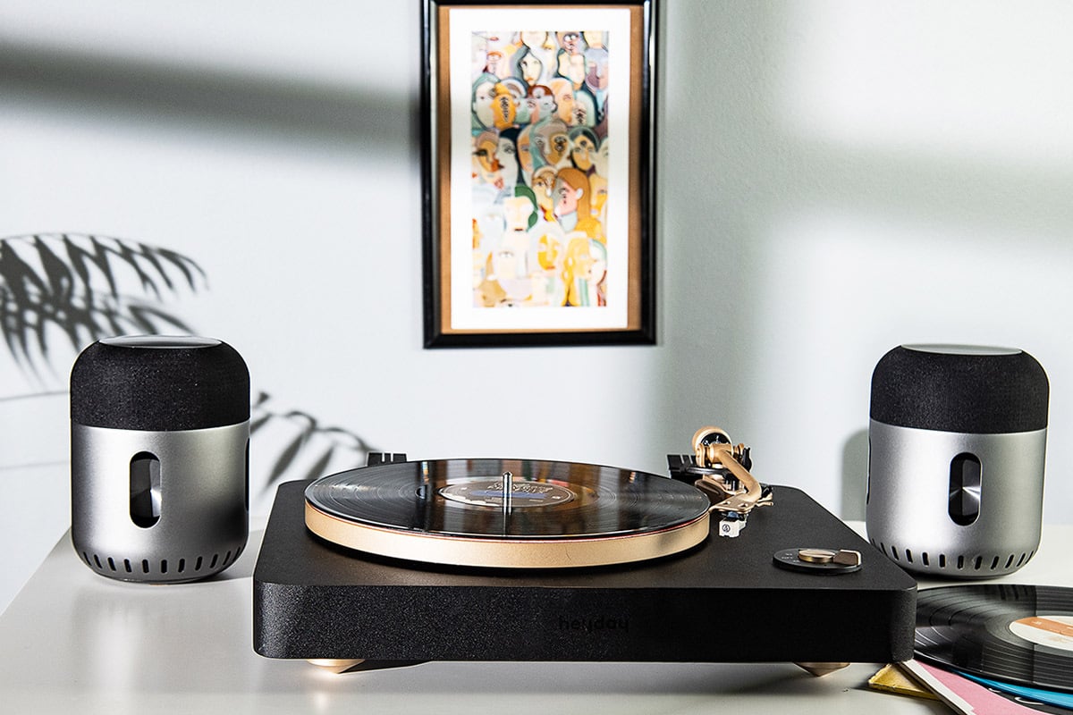 two bluetooth speakers and turntable