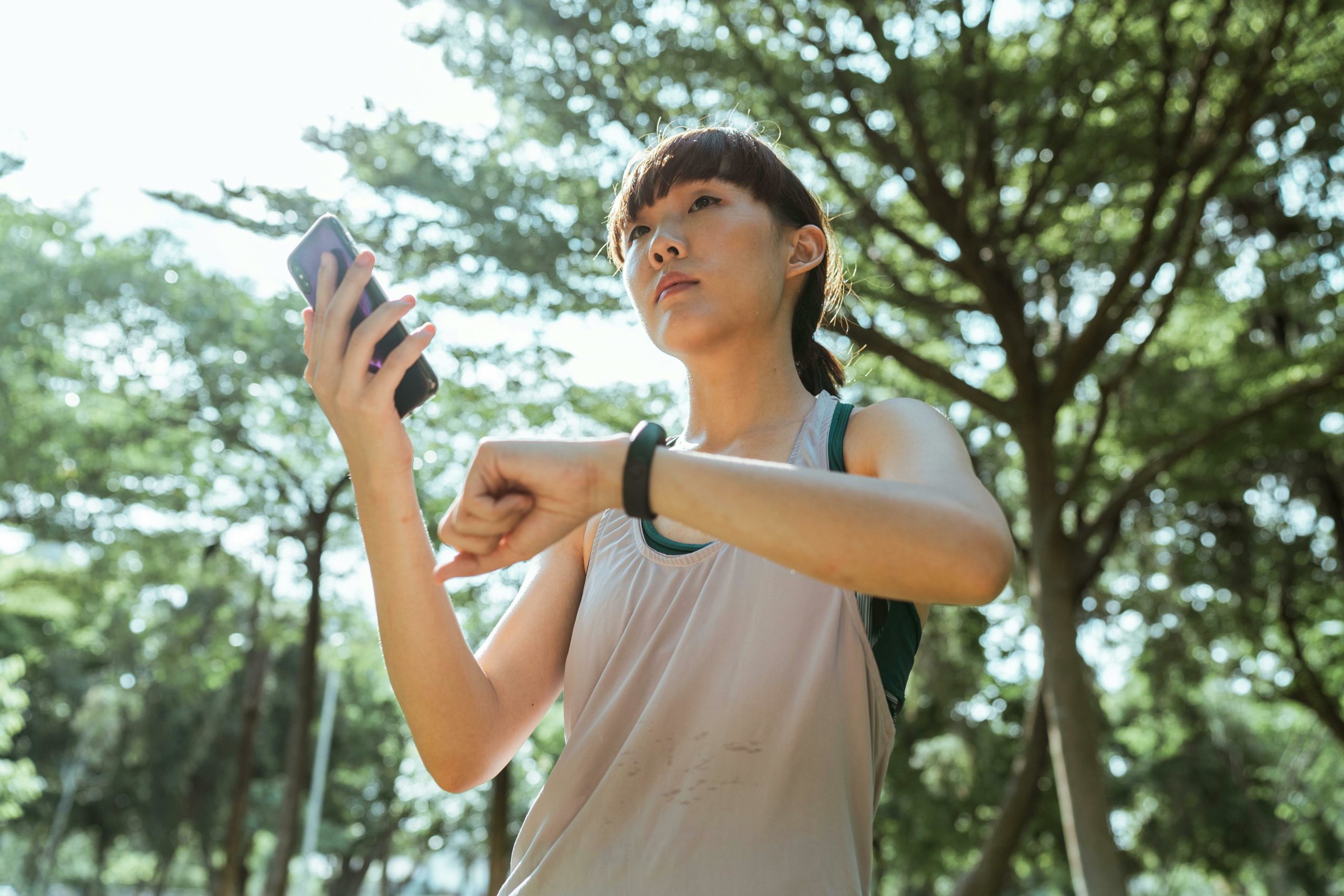 Woman with phone and watch