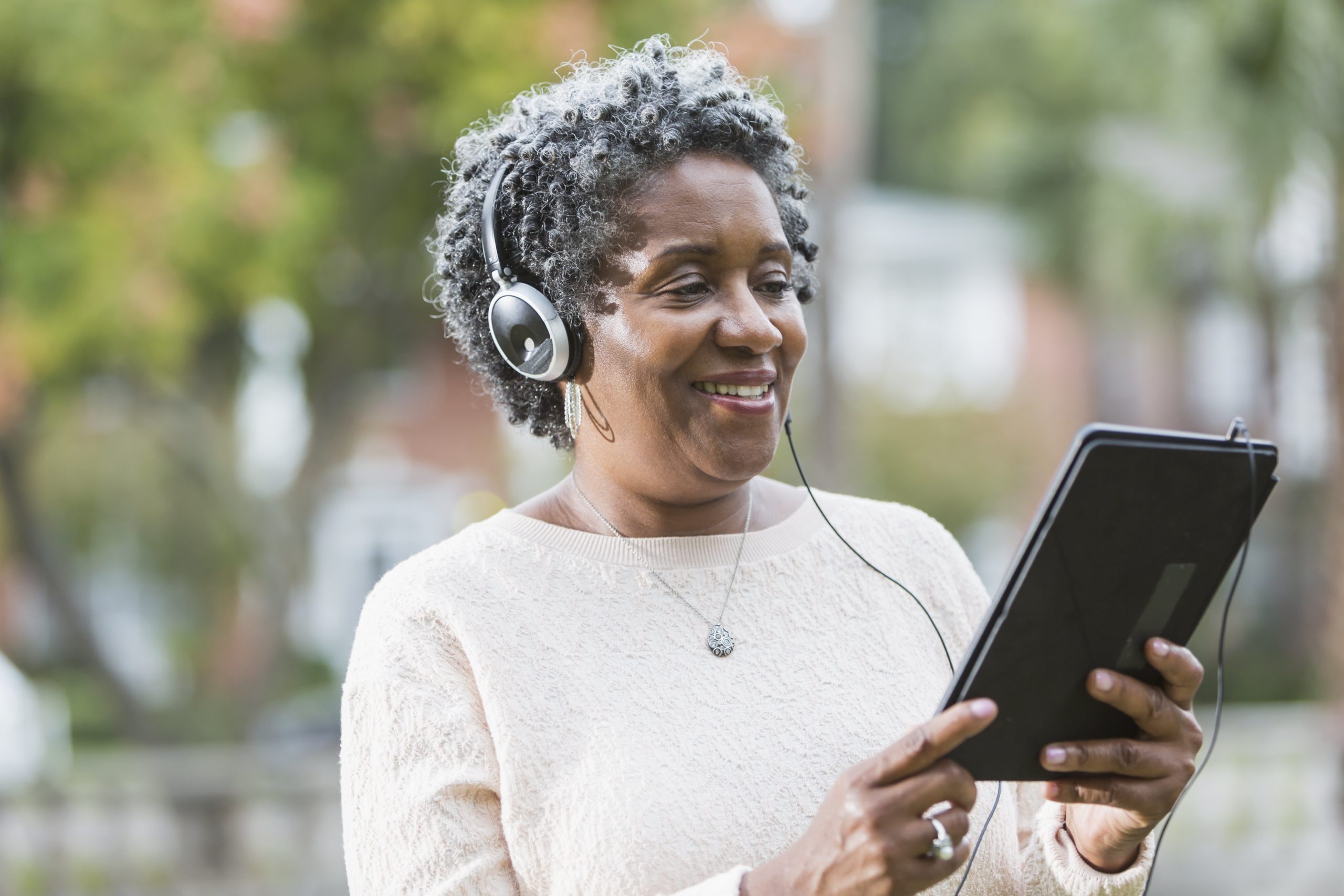 woman listening to audio book