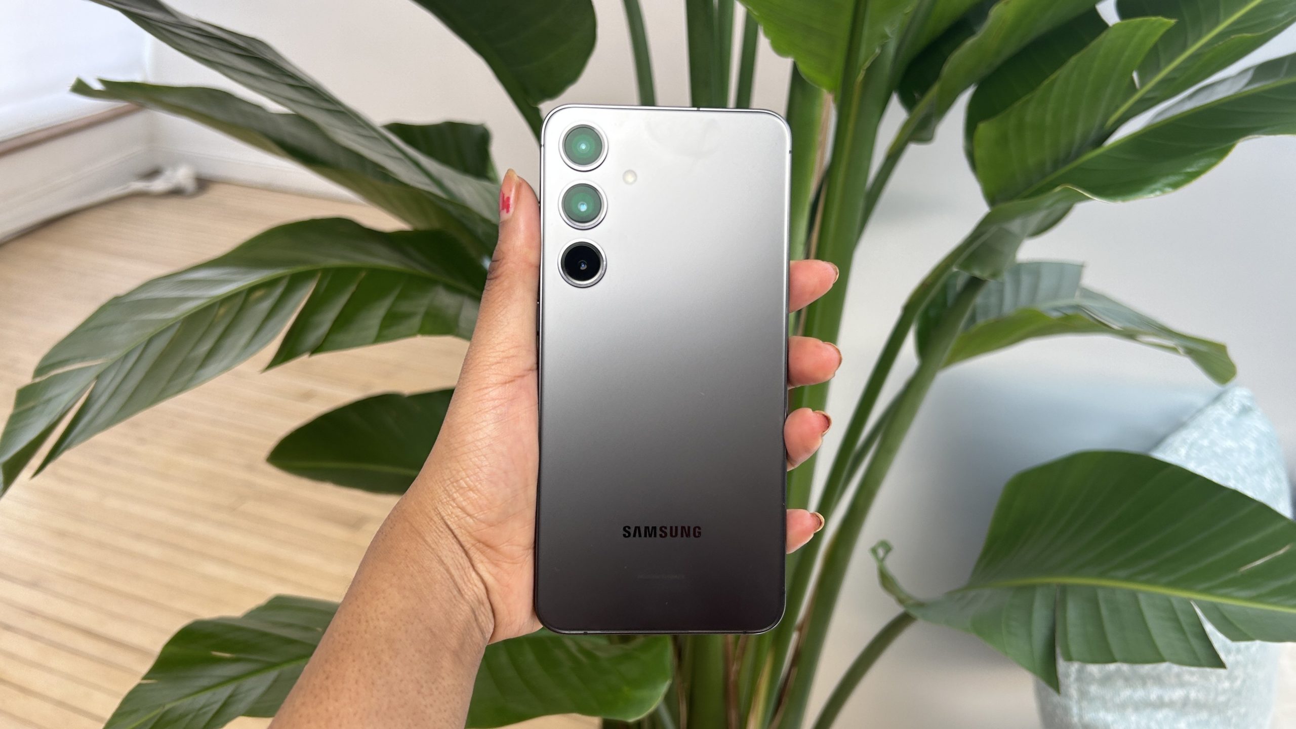 Woman holding Galaxy S24 