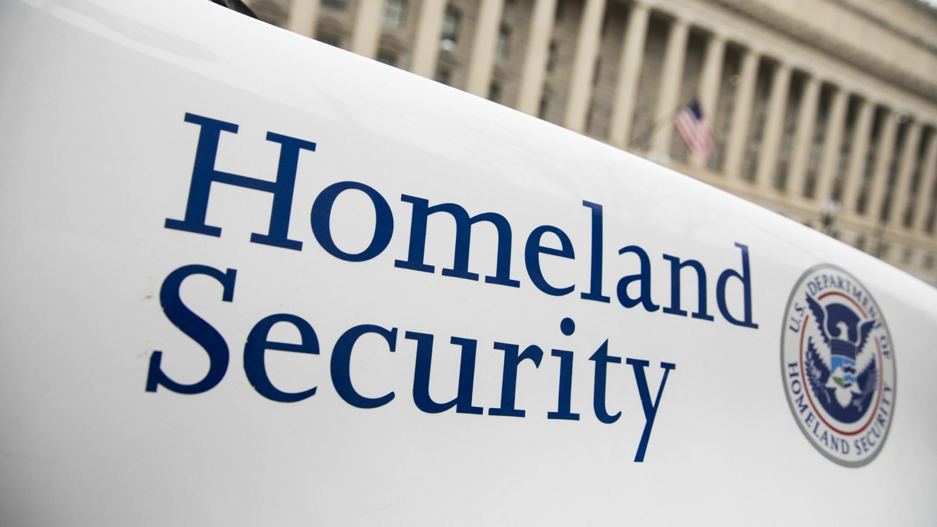 The Department of Homeland Security logo is seen on a law enforcement vehicle.