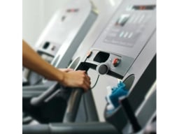 Bluetooth transmitter plugged into exercise equipment