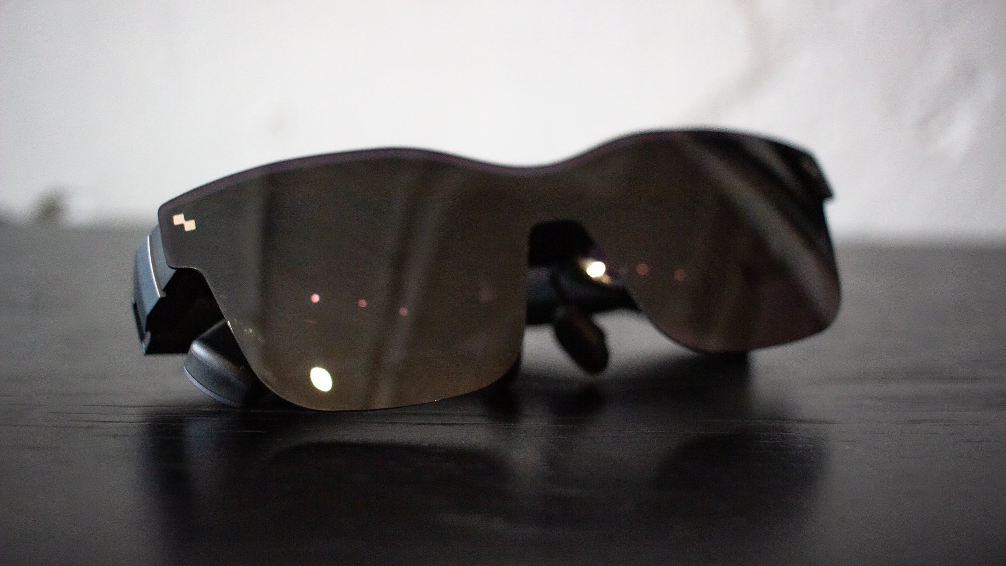 dark XR glasses with arms folded up