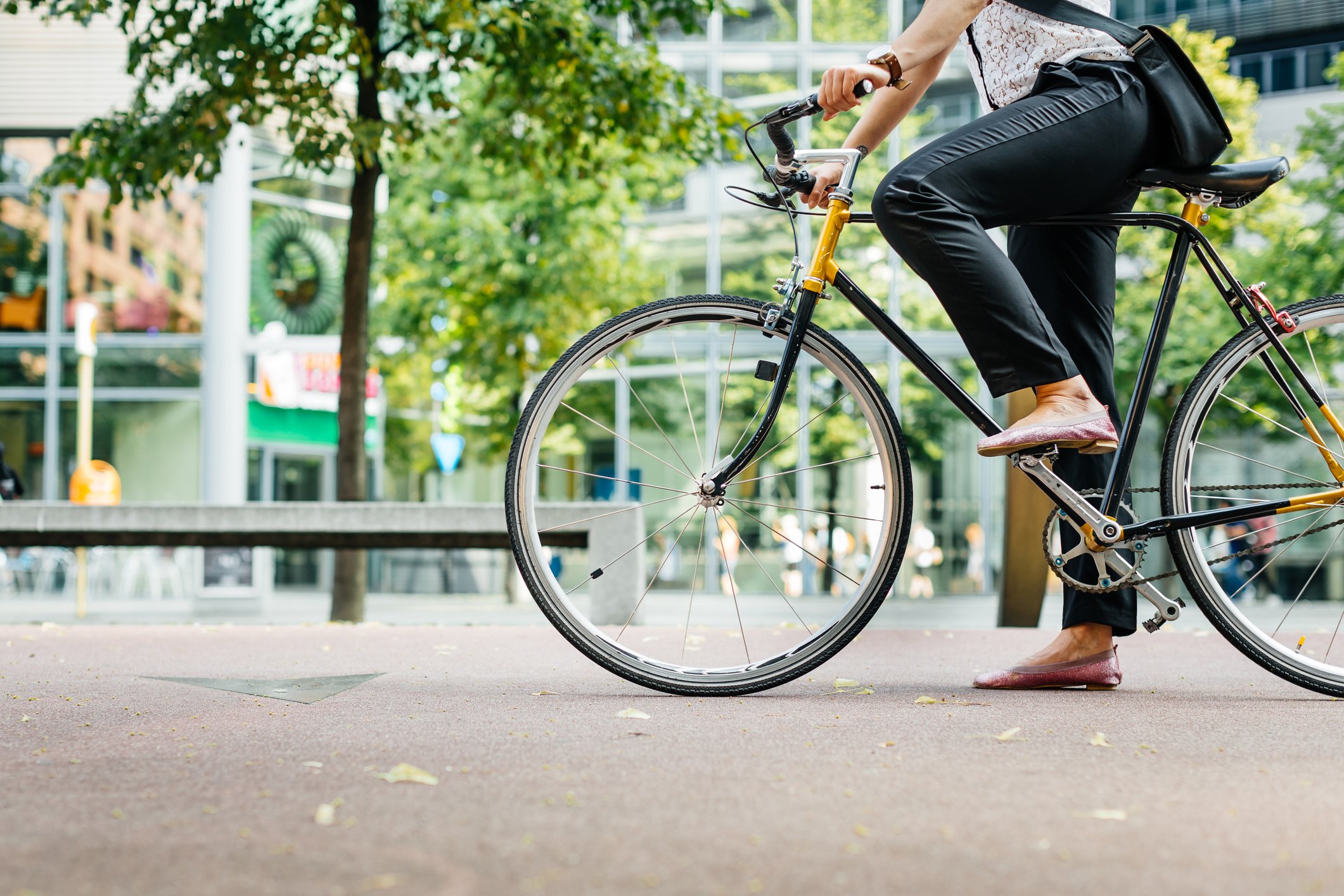 Woman's legs on bicycle