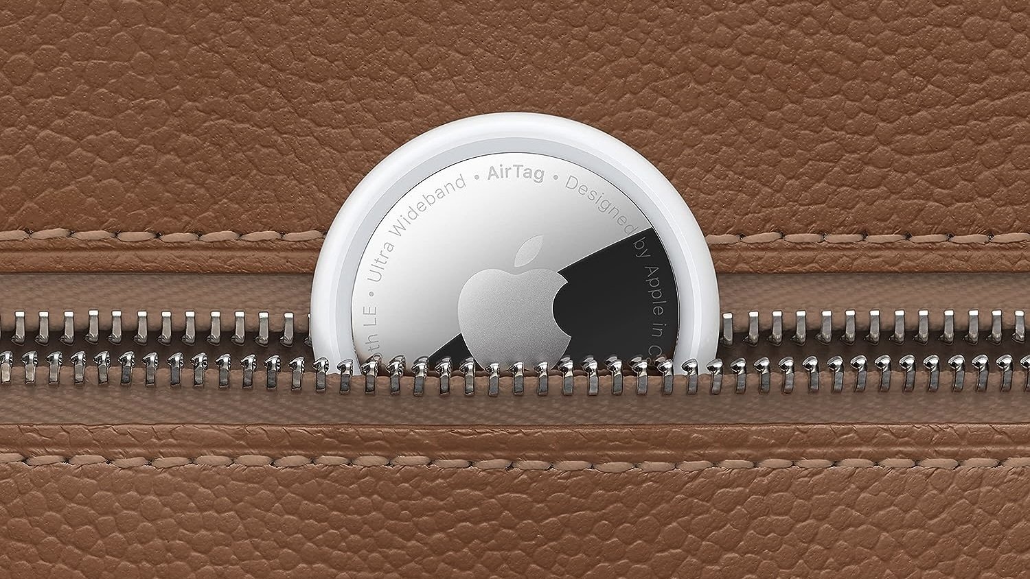 airtag halfway in leather zippered pocket