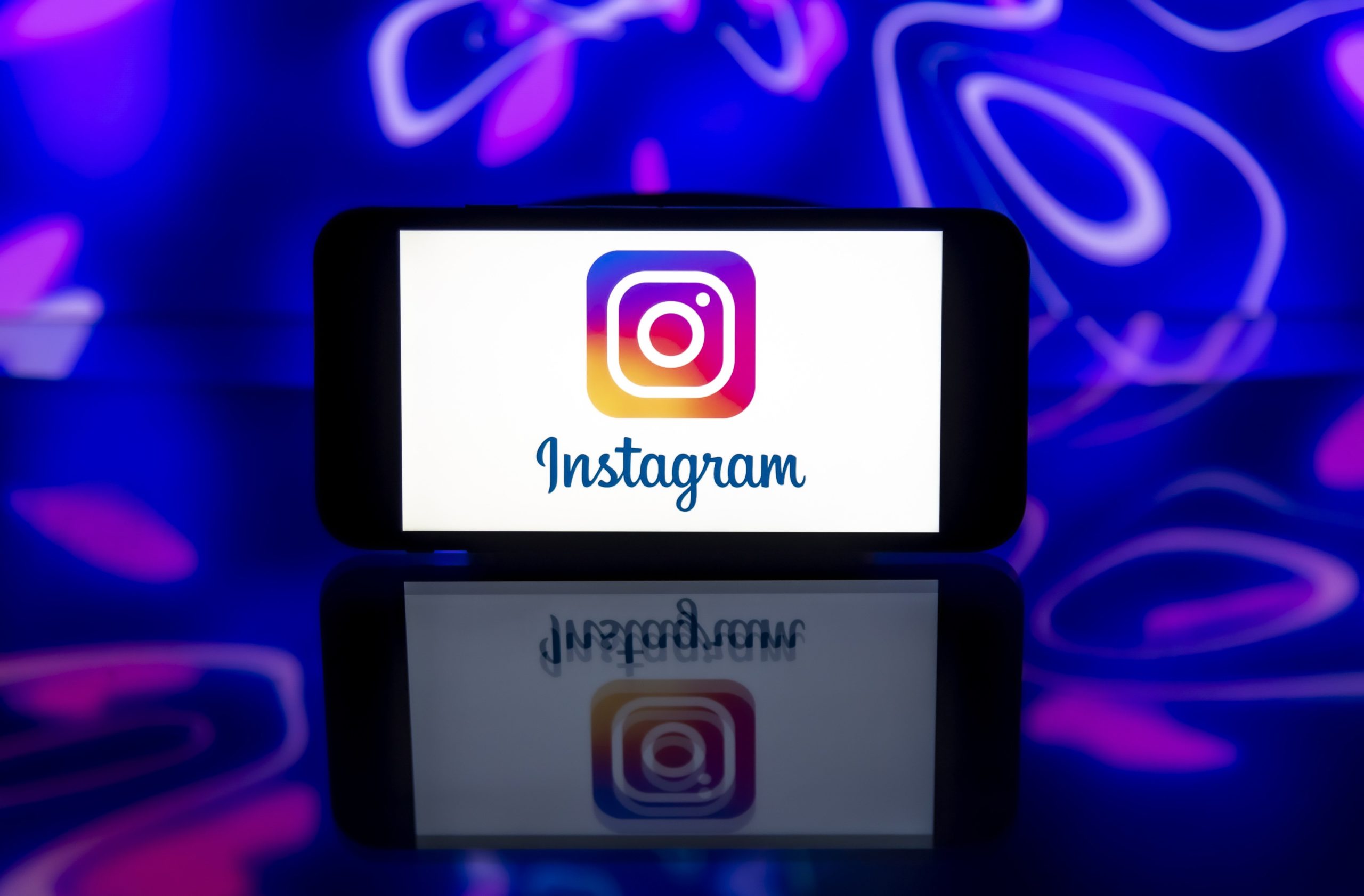 In this photo illustration, an Instagram logo is seen displayed on a mobile phone screen.