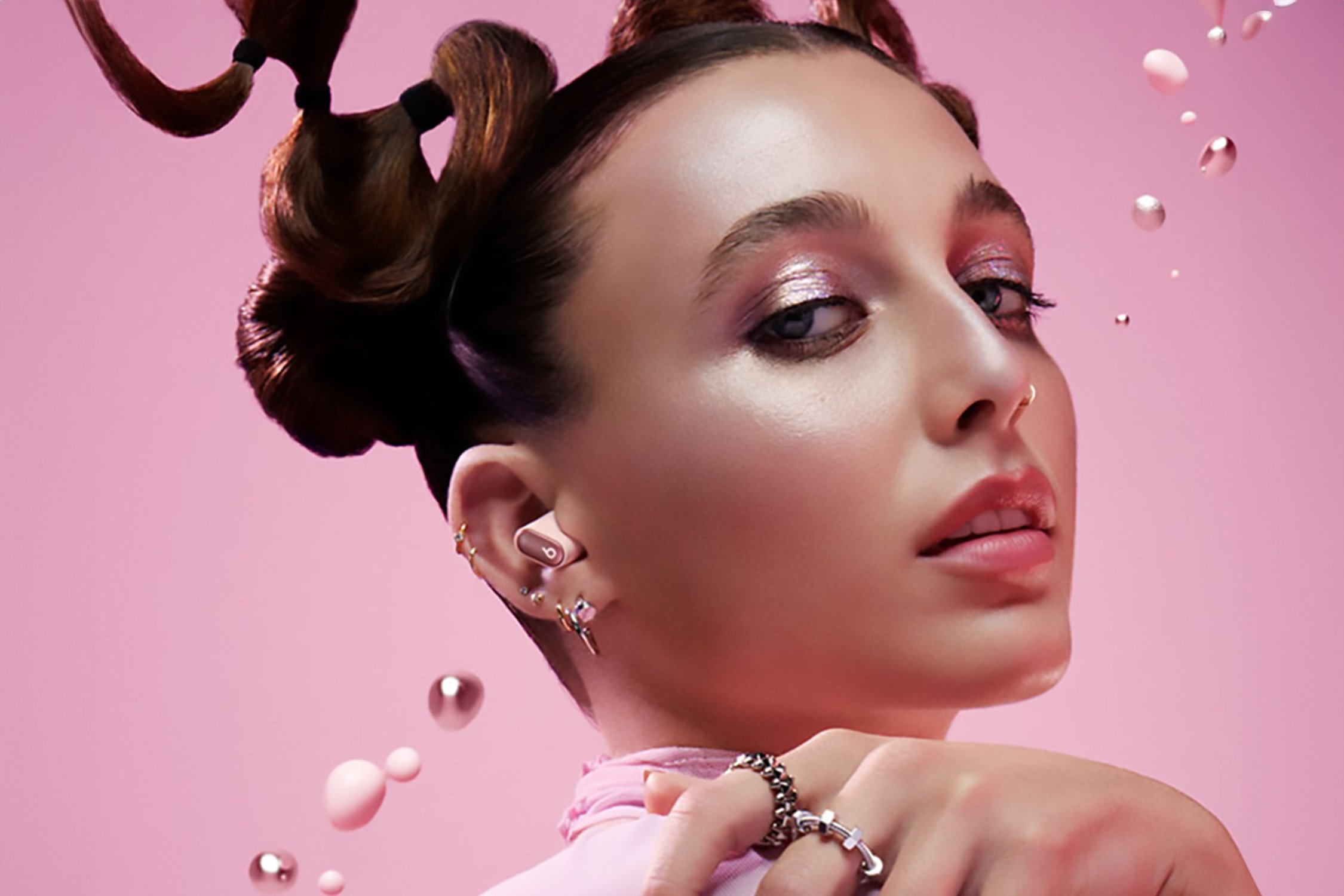 Influencer wearing Beats ear buds