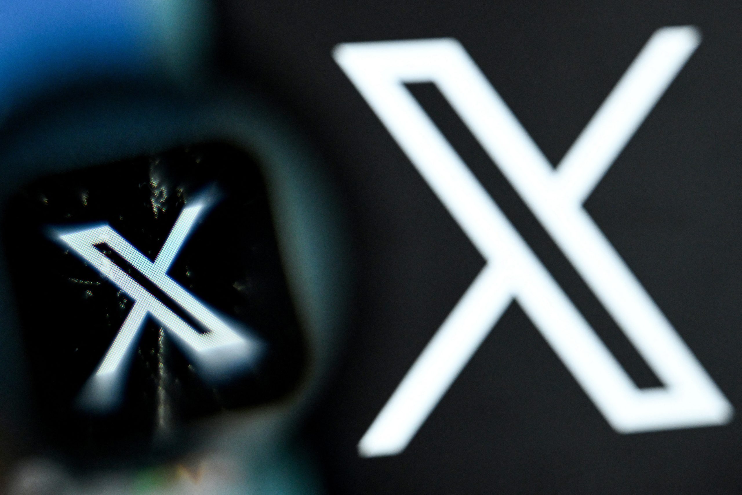 The logo of US online social media and social networking service X - formerly Twitter - on a smartphone screen.