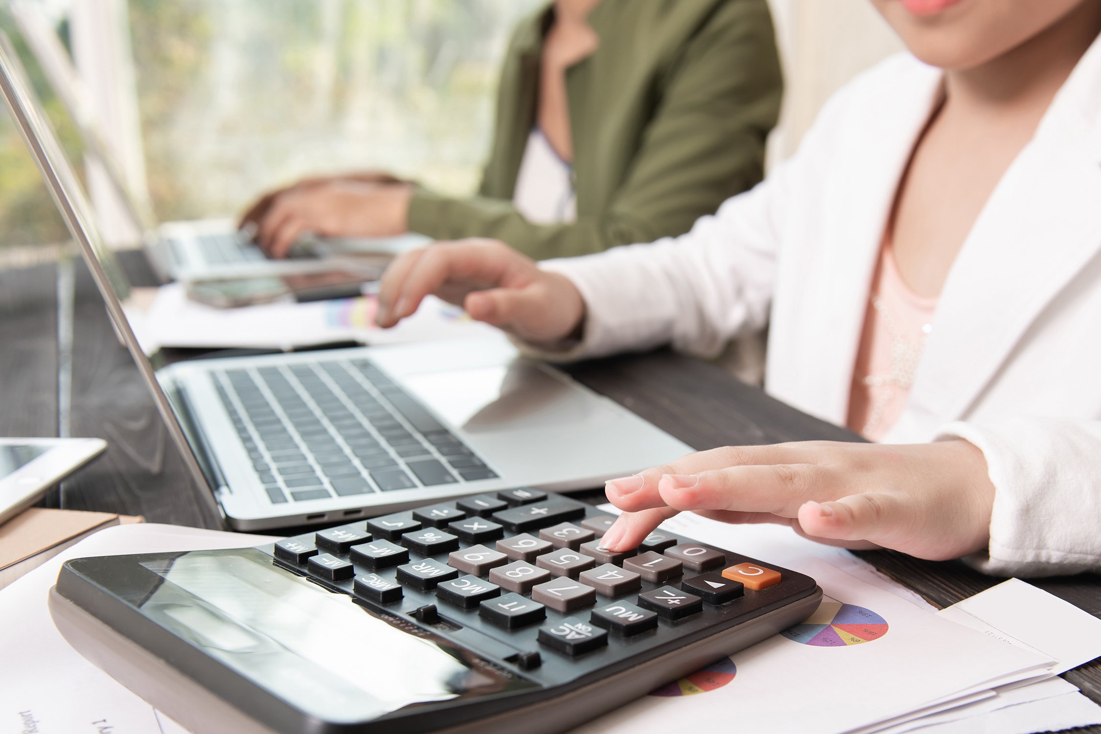 Person crunching numbers for taxes