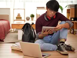 Young person managing their finances online