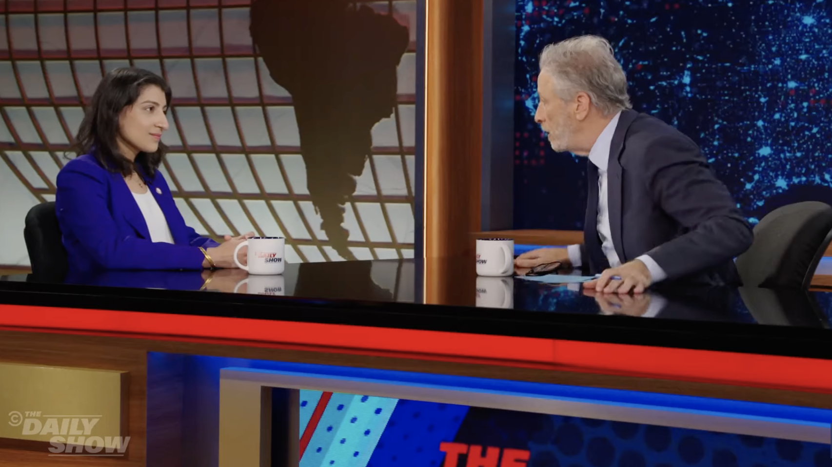 Jon Stewart and Lina Khan