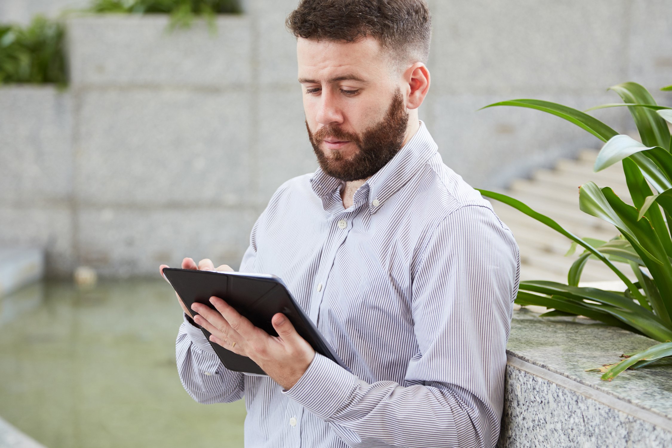 Man using tablet.