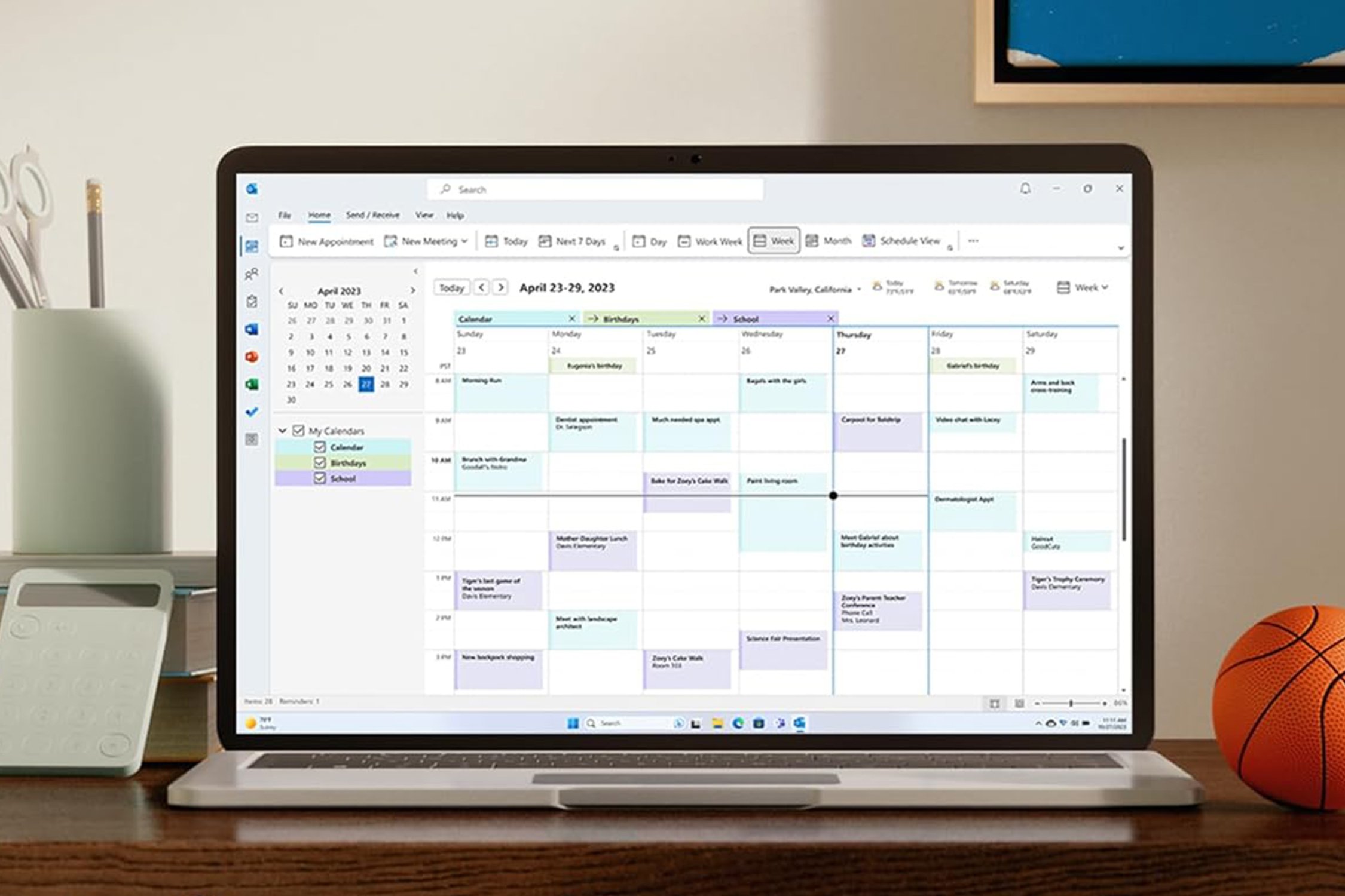 Laptop open to calendar.