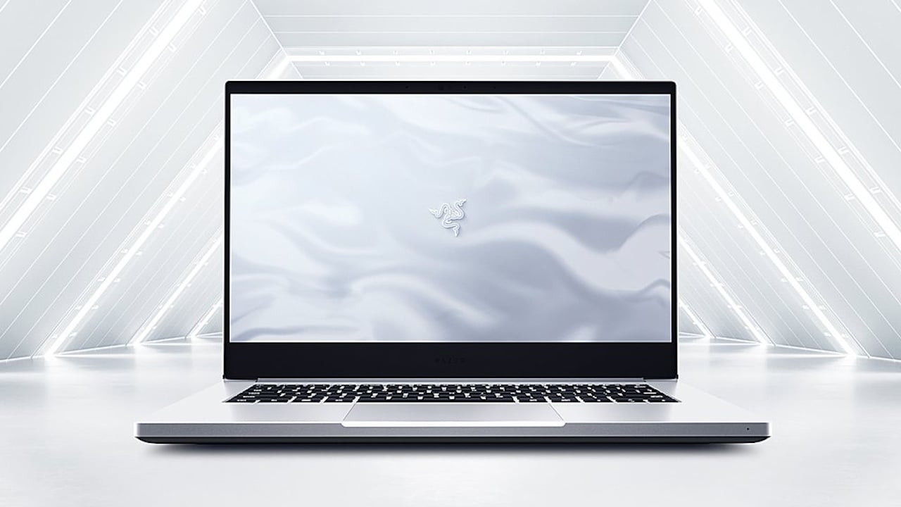 Razer Blade 14 gaming laptop in front of a hexagonal background