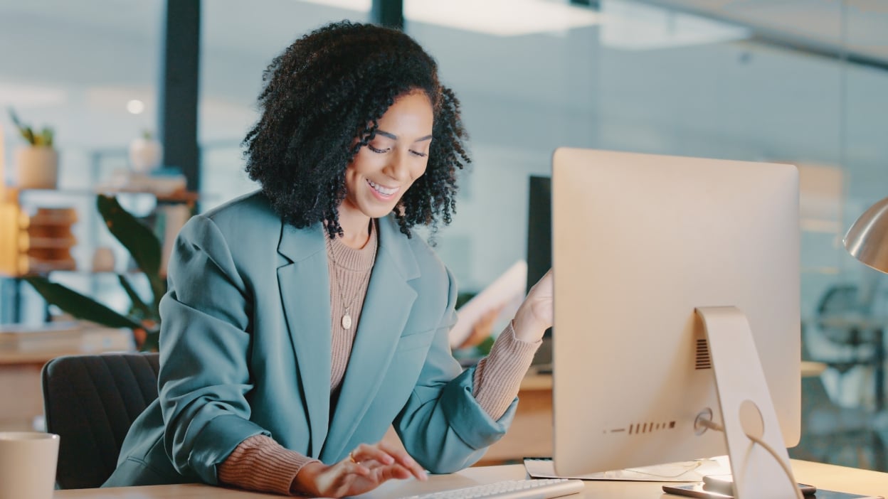 Woman in front of screen