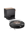 an irobot roomba vacuum with its included base on a white background