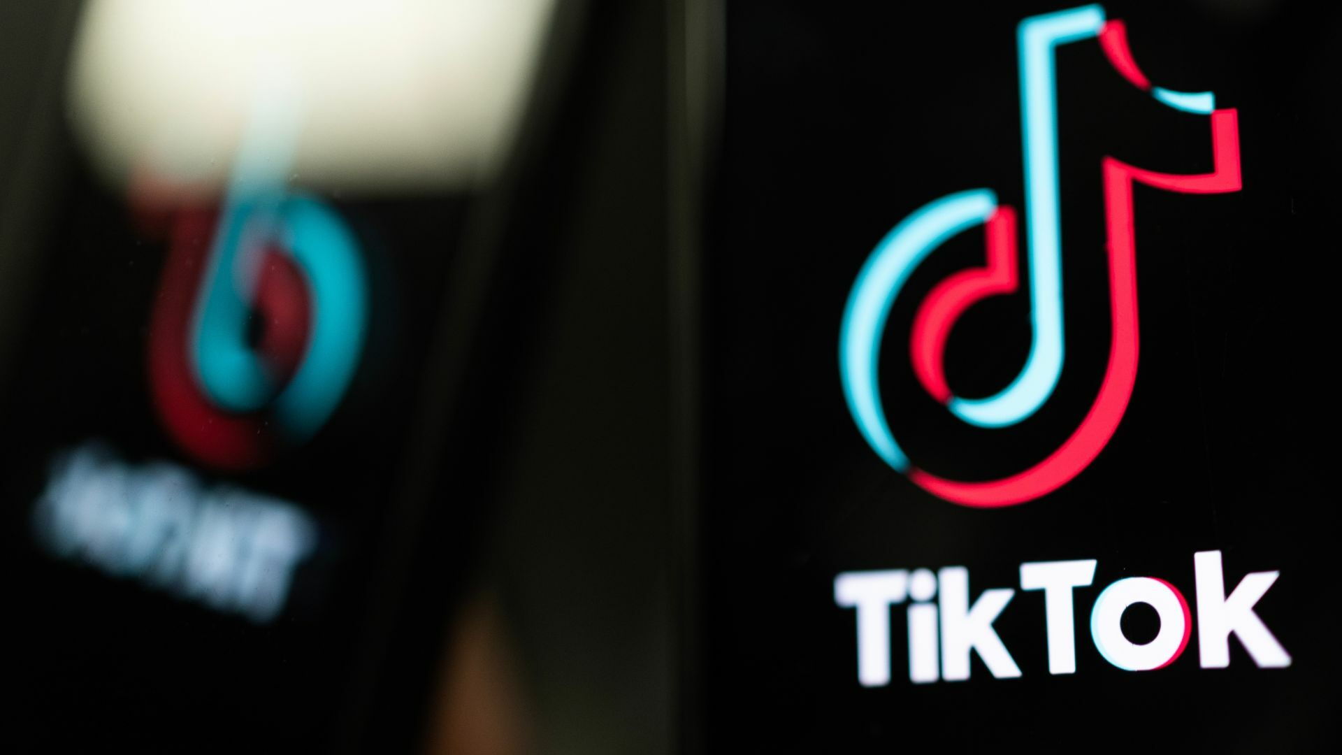In this photo illustration, a TikTok logo is displayed on an iPhone in London, England.