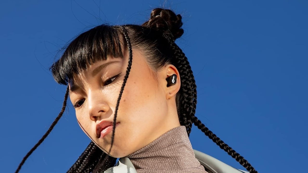 Person wearing Beats Studio buds