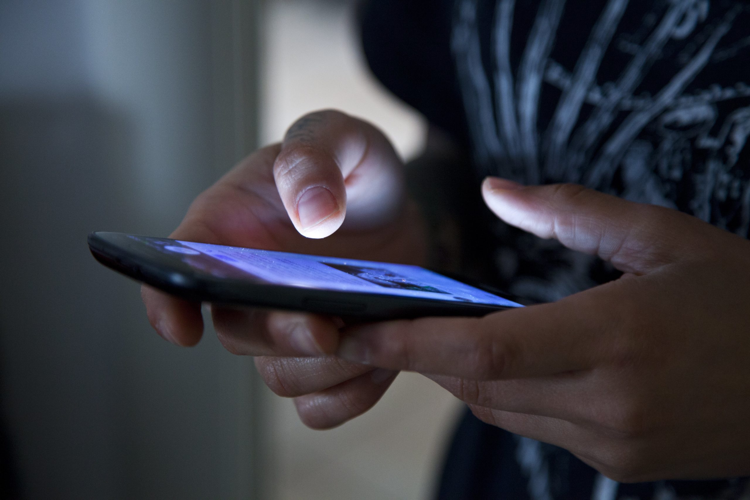 Person holding smartphone