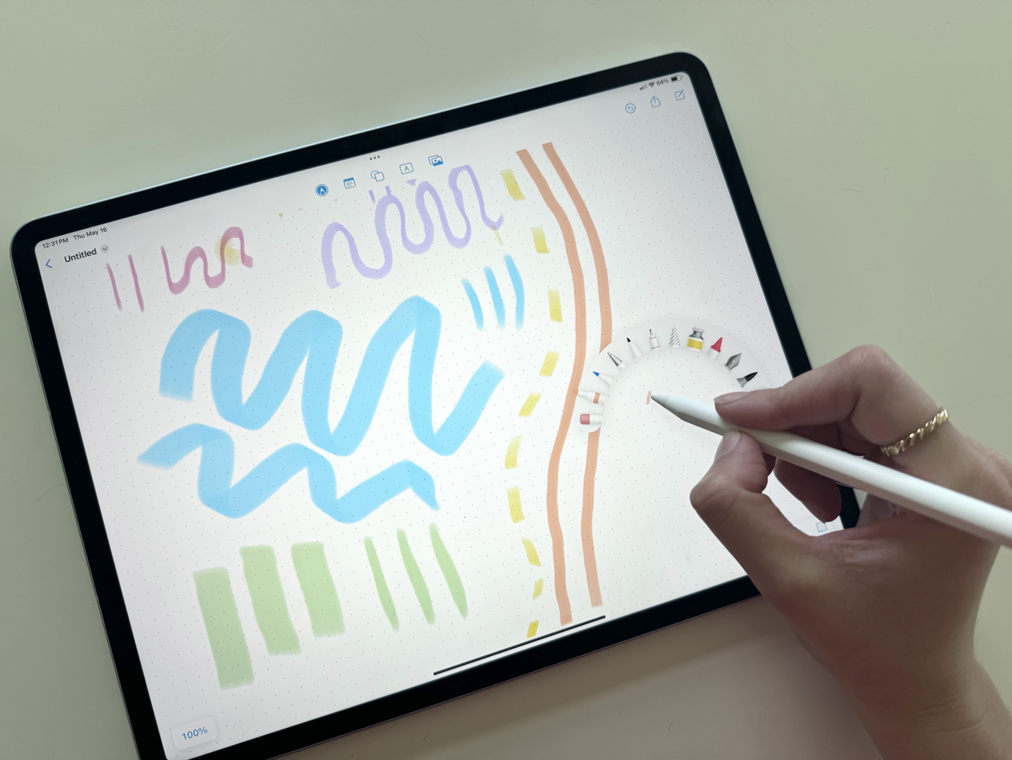 Woman drawing doodles on the iPad Air