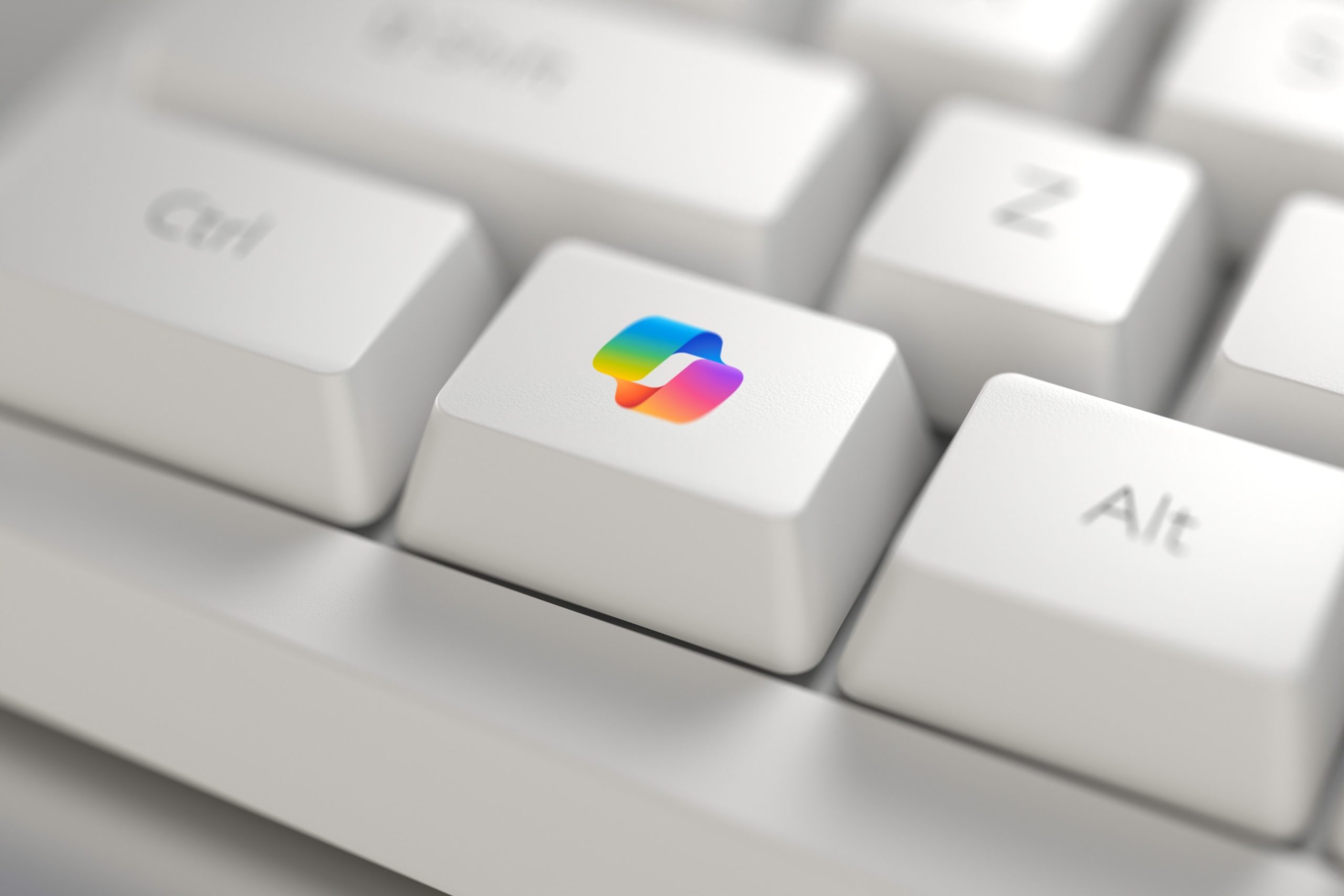 A Microsoft Copilot logo on a keyboard key.