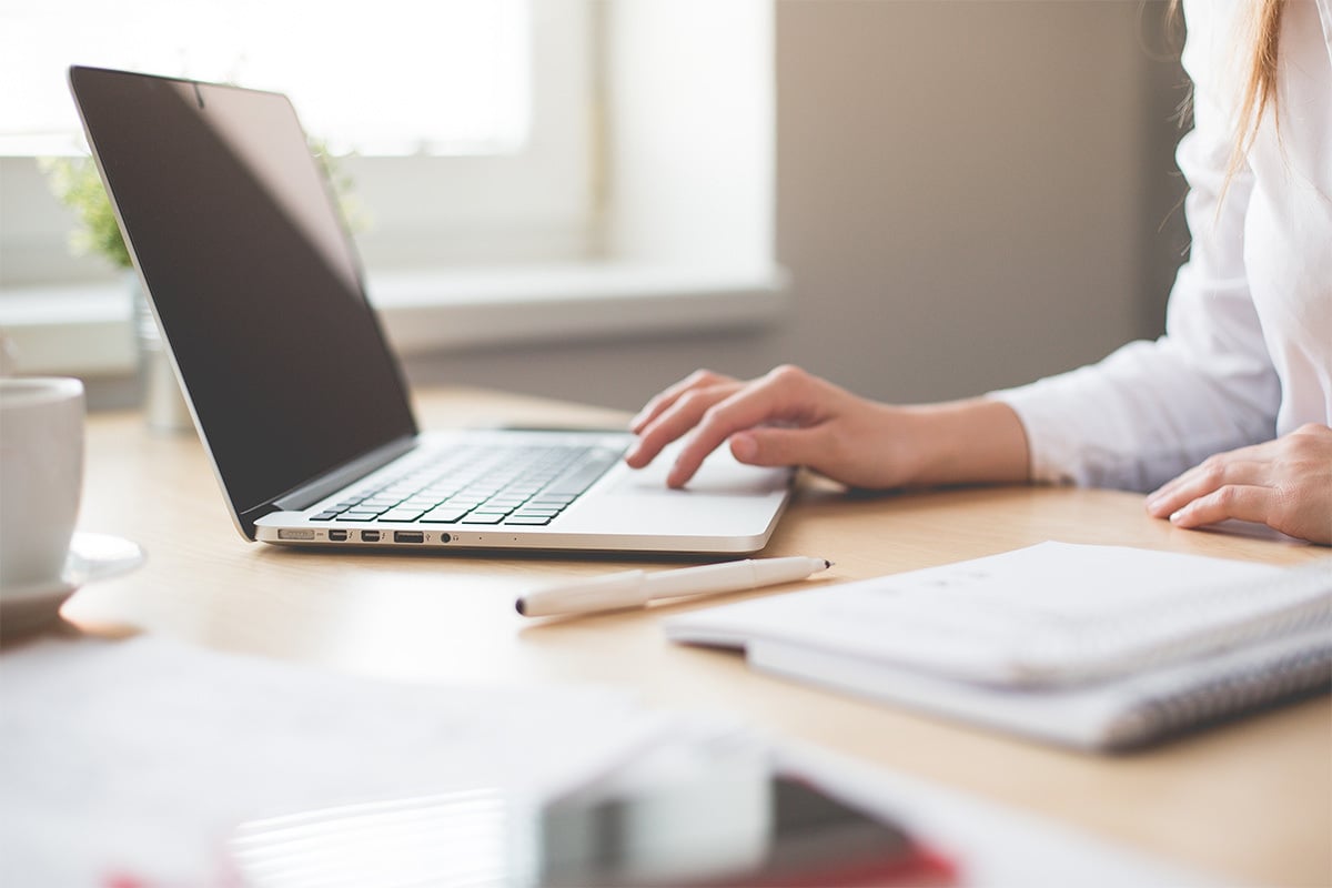 Person using a computer for web hosting