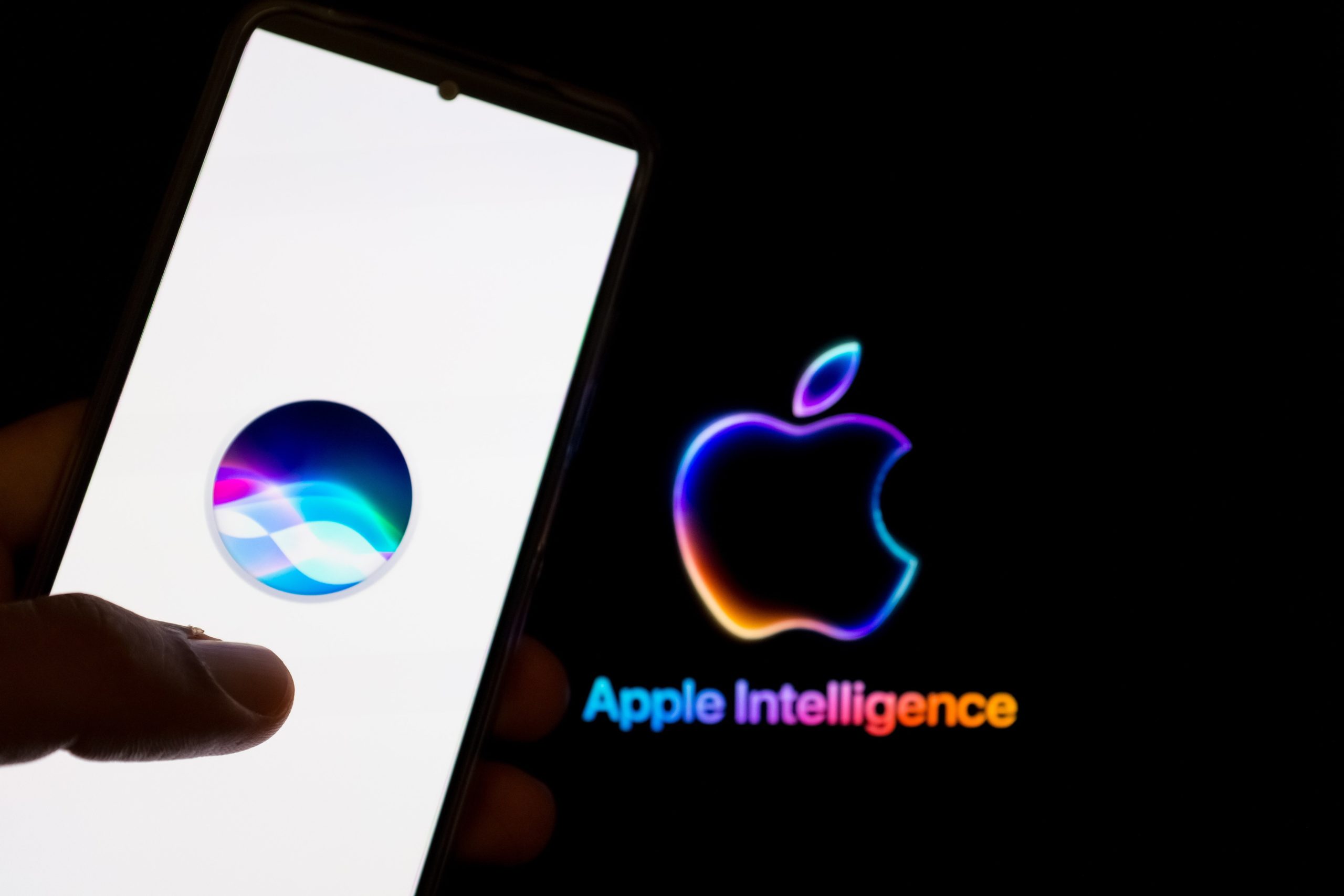 apple intelligence logo by phone