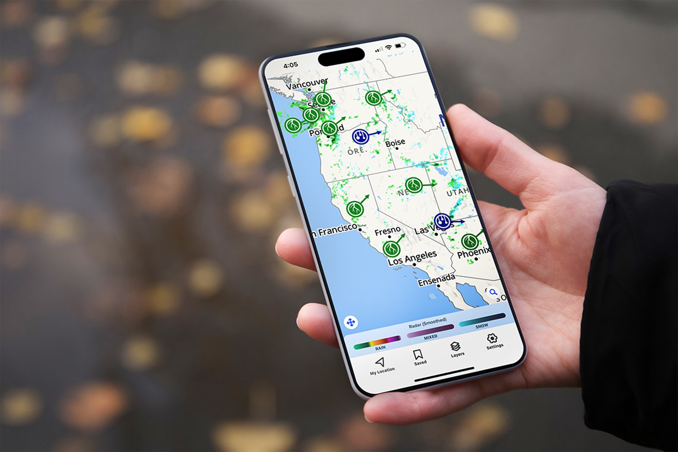 Man using phone to look at weather.