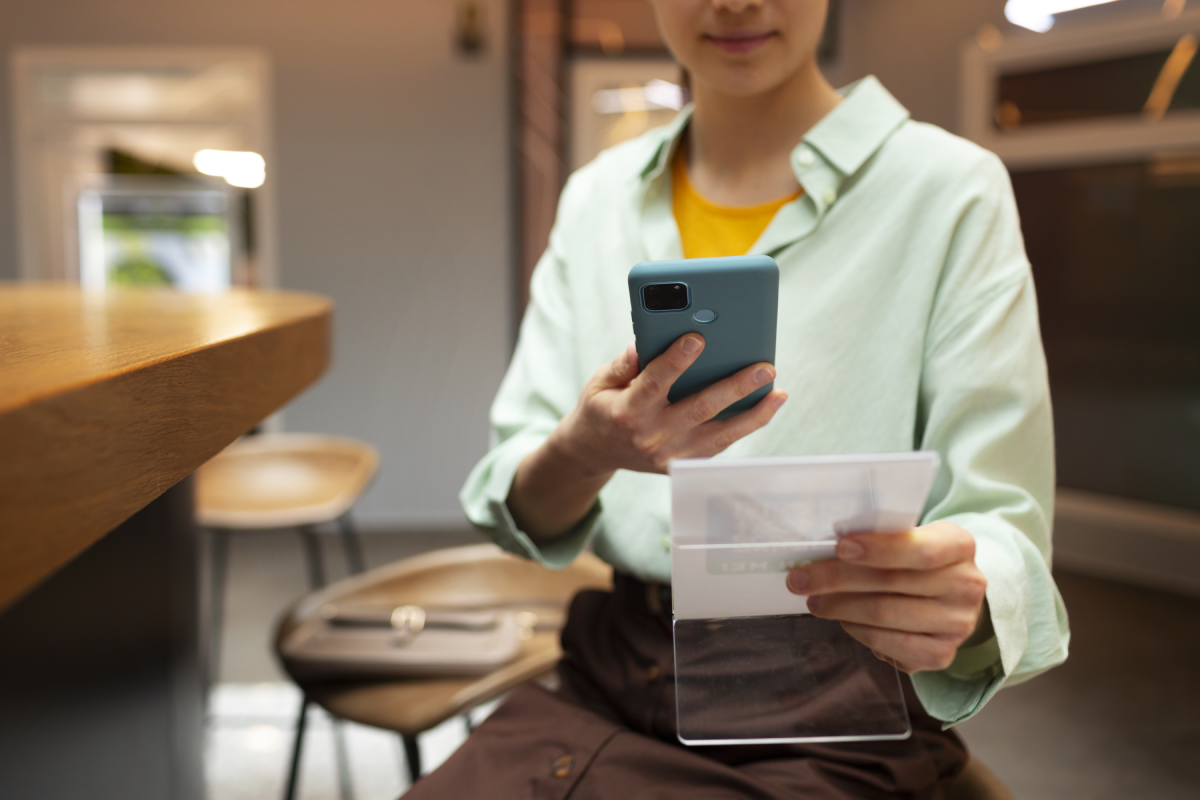 A person scanning an object on their phone