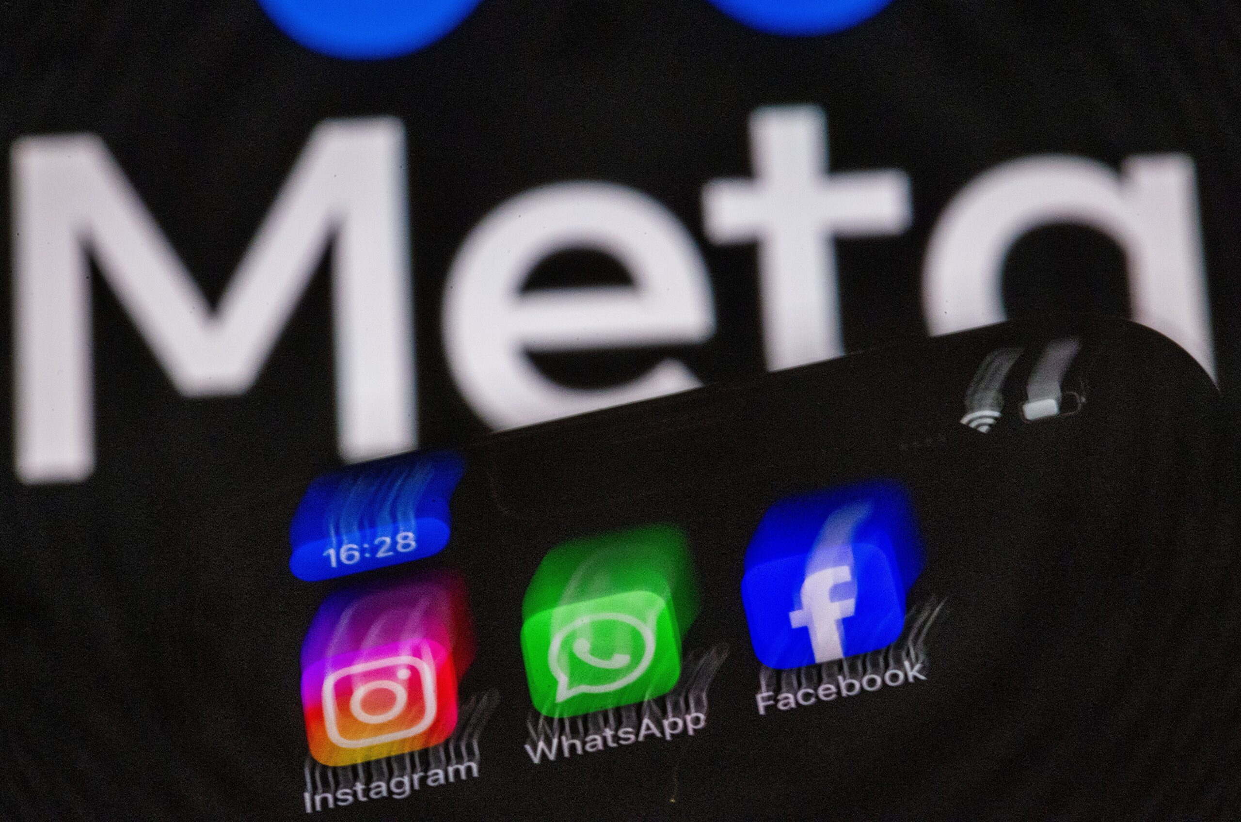 Facebook, WhatsApp, and Instagram apps under Meta logo