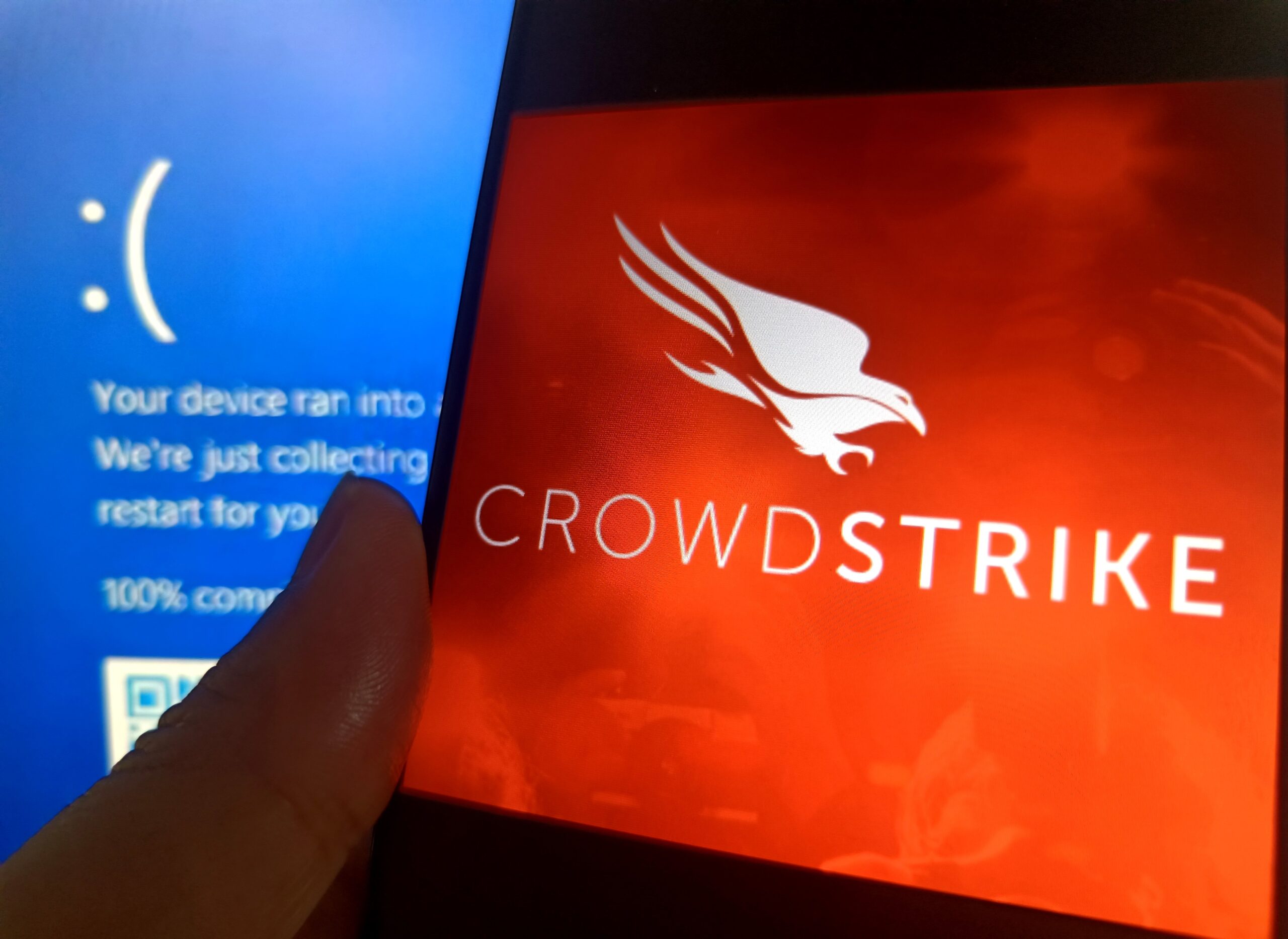 CrowdStrike logo over the Blue Screen of Death