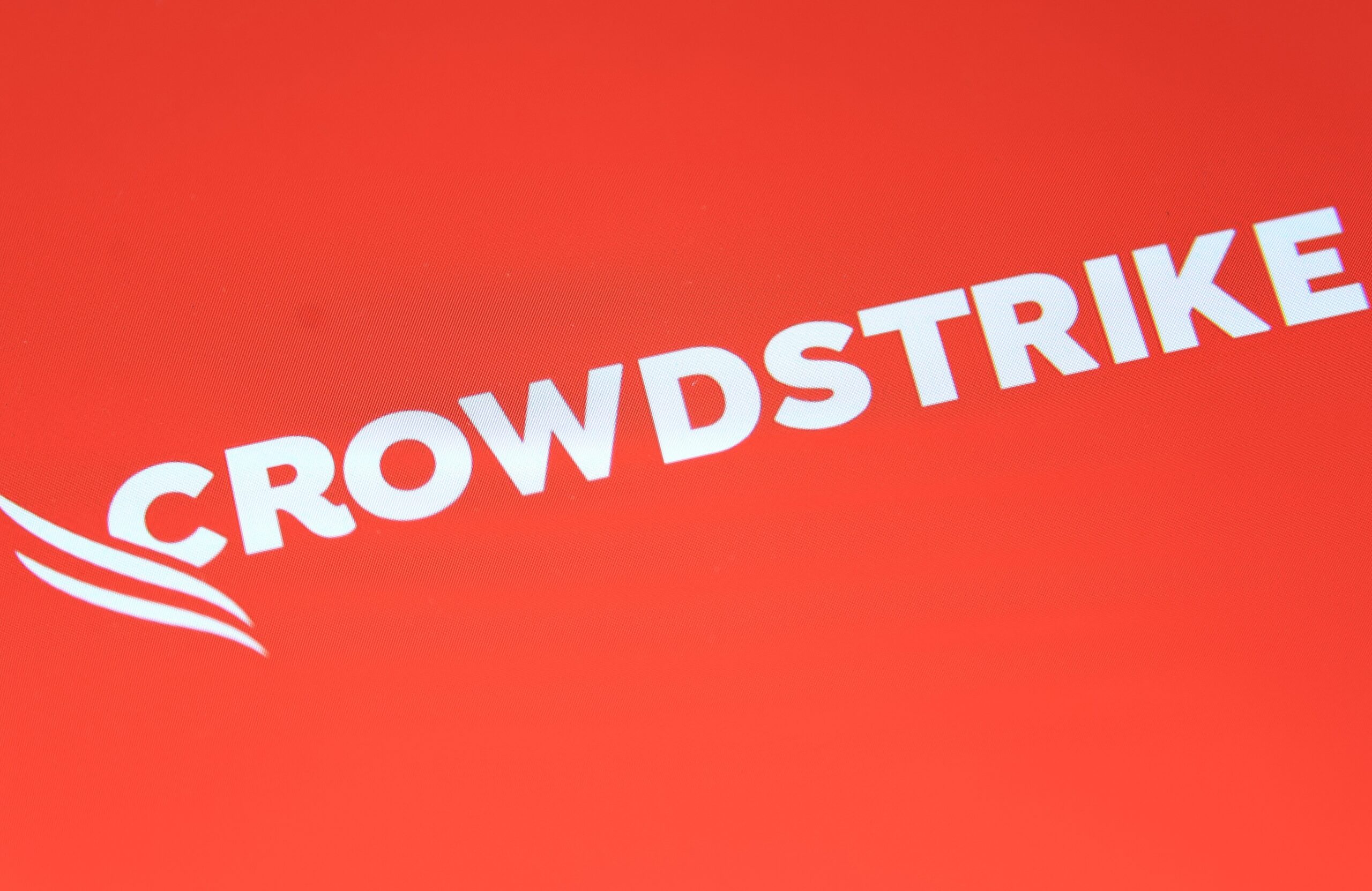 crowstrike logo over orange background