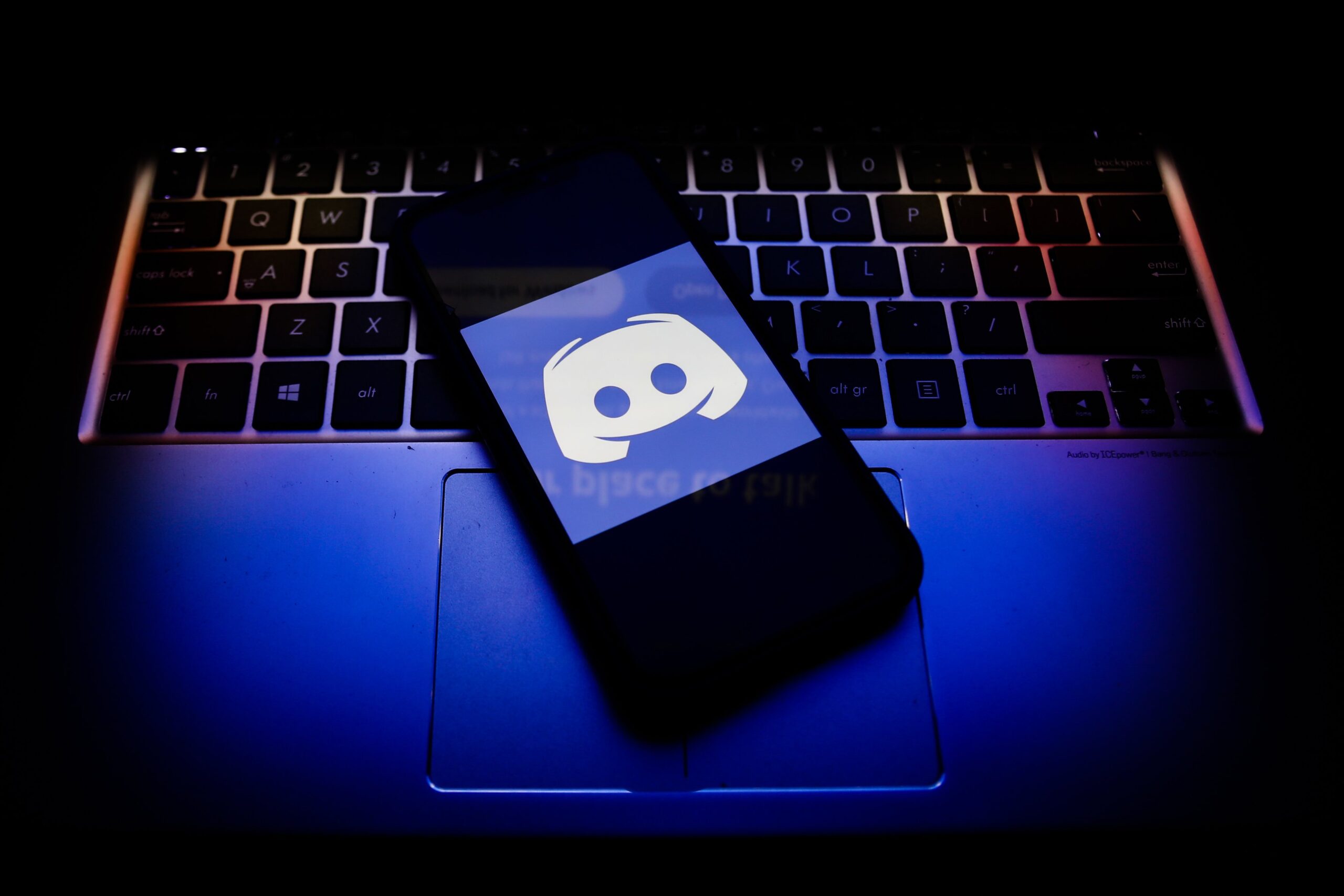 Discord logo displayed on a phone screen