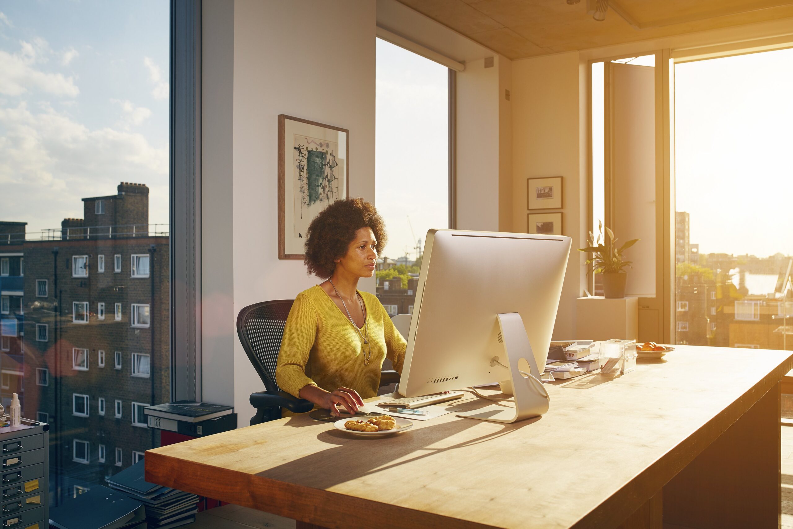 woman using desktop computer