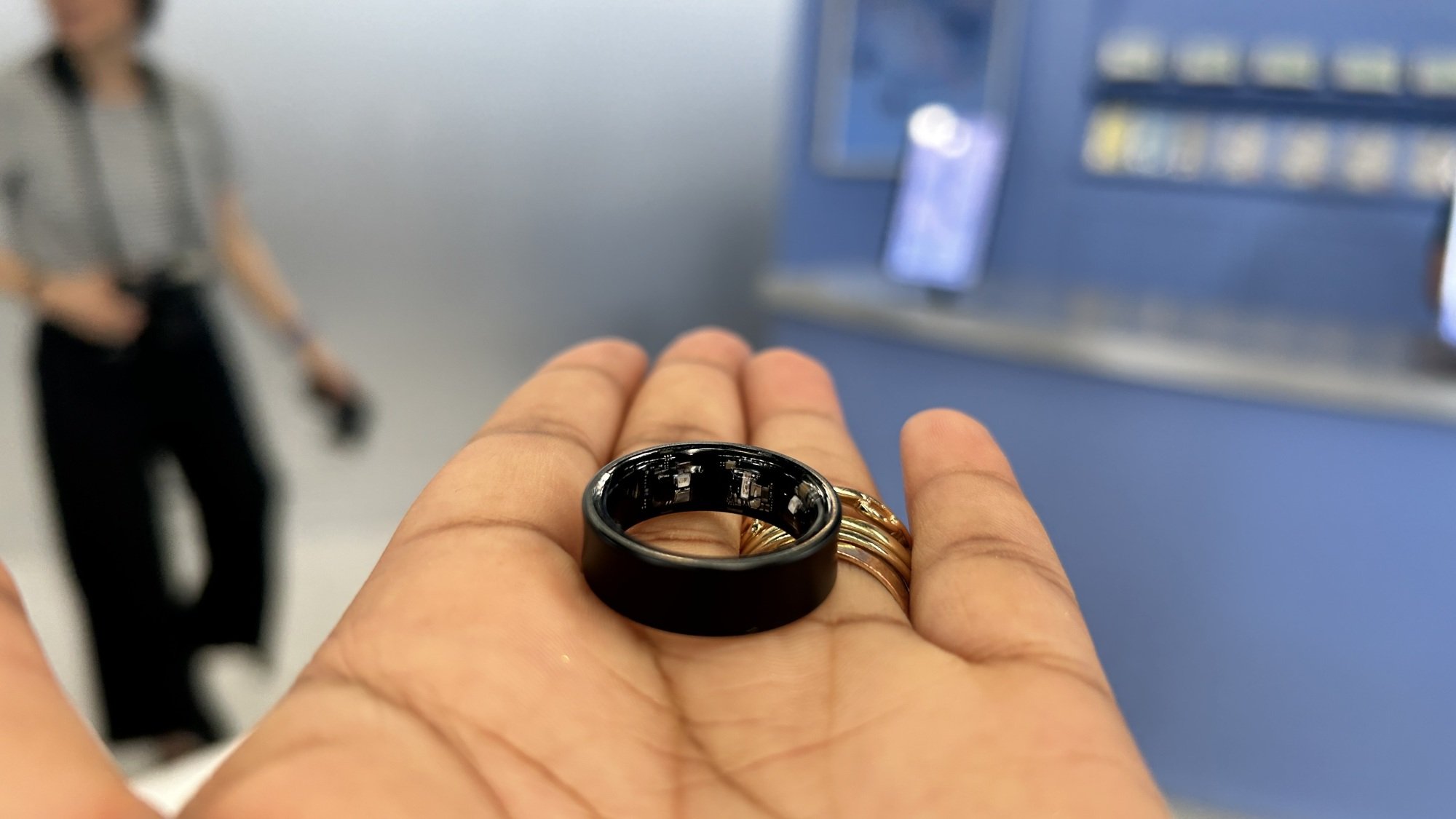 Woman holding Samsung Galaxy Ring