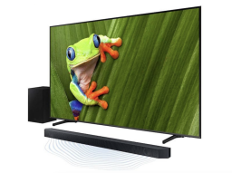 Samsung QLED TV with frog screensaver and soundbar system with audio waves coming from speaker