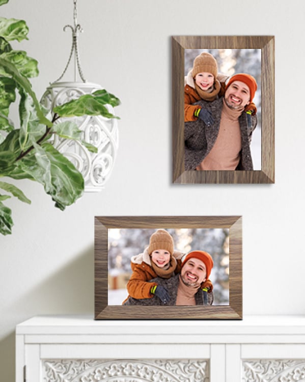 two picture frames with family photo