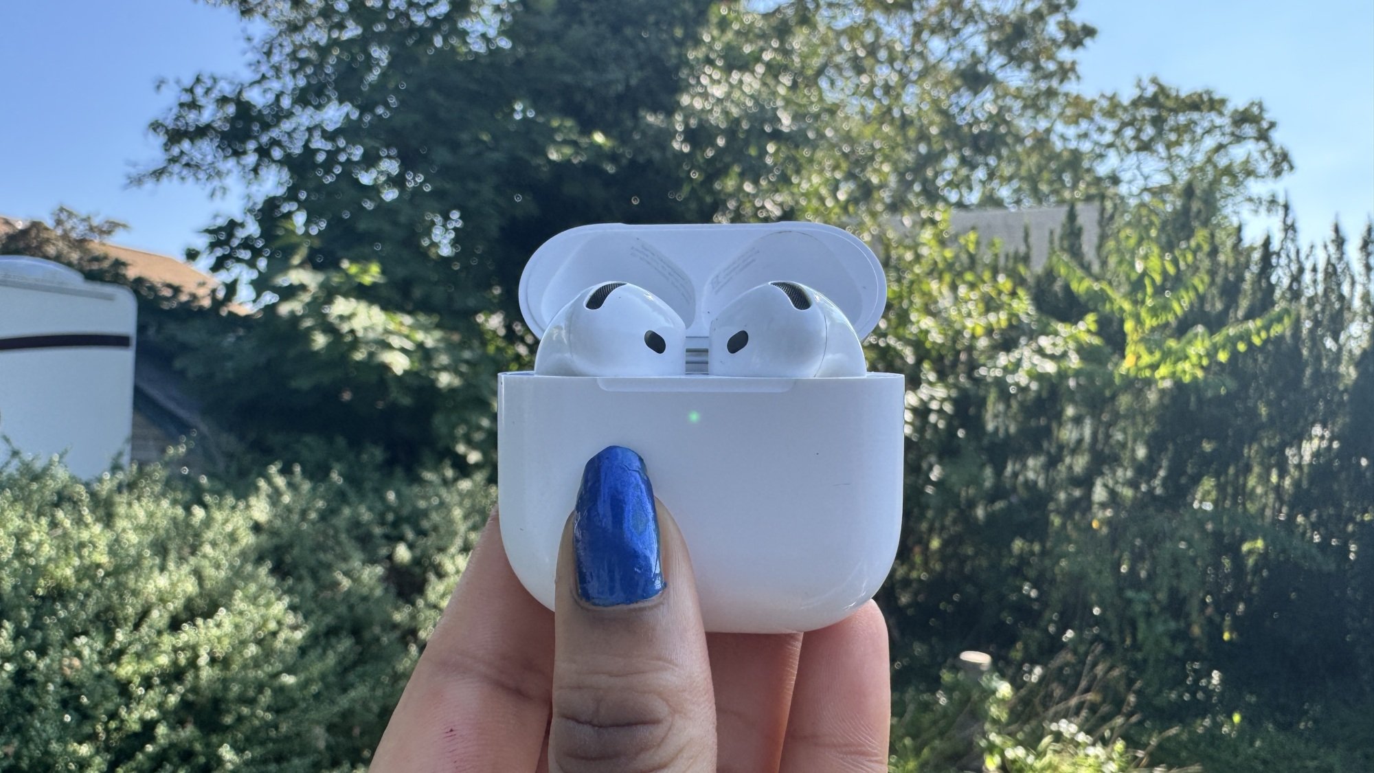 AirPods 4 inside a garden