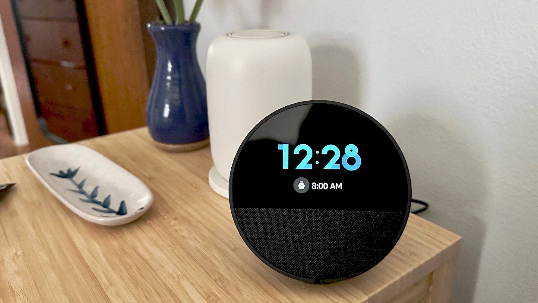 amazon spot alarm clock on table