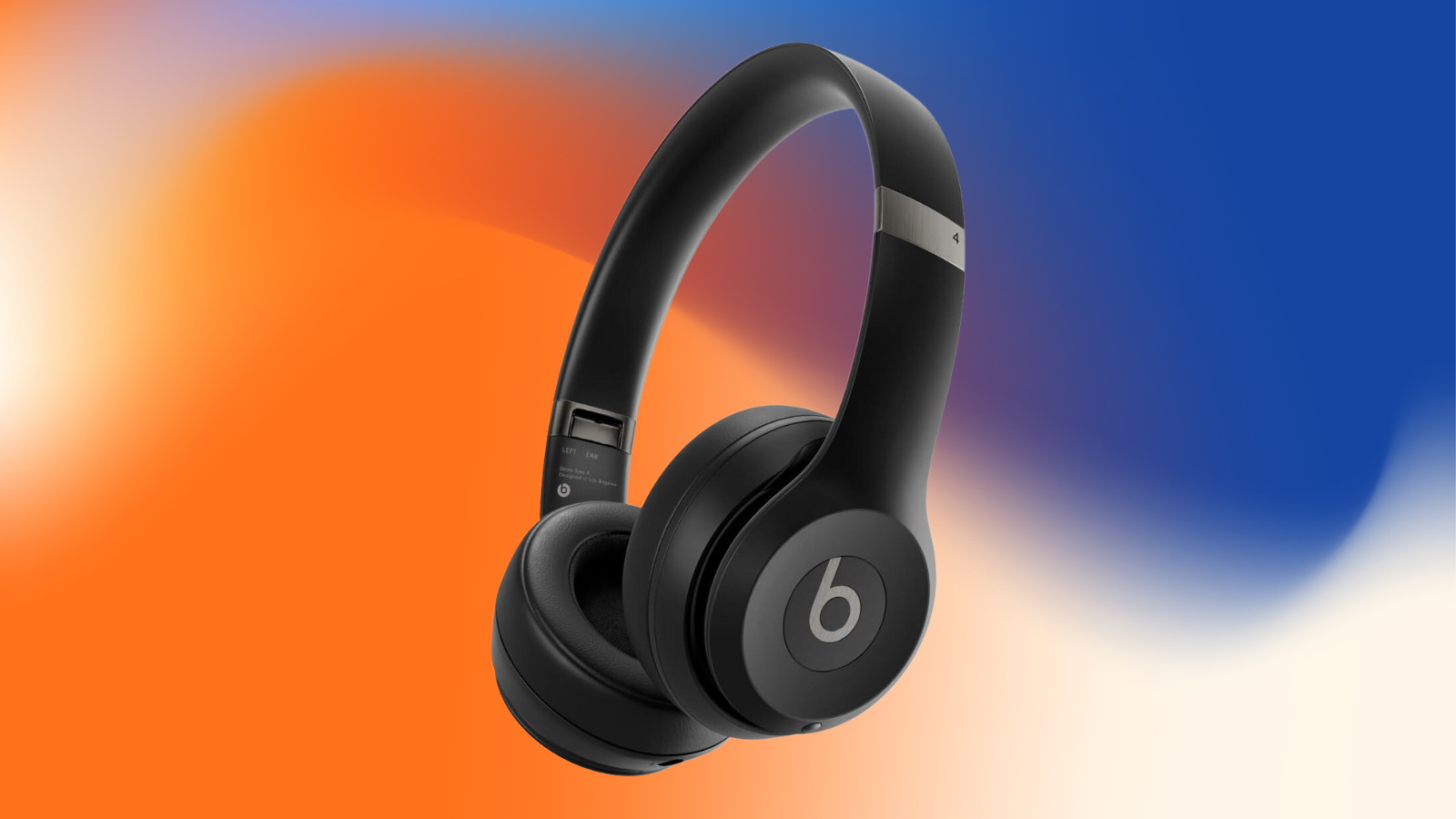 Beats Solo4 headphones on a orange, white and blue watercolor background