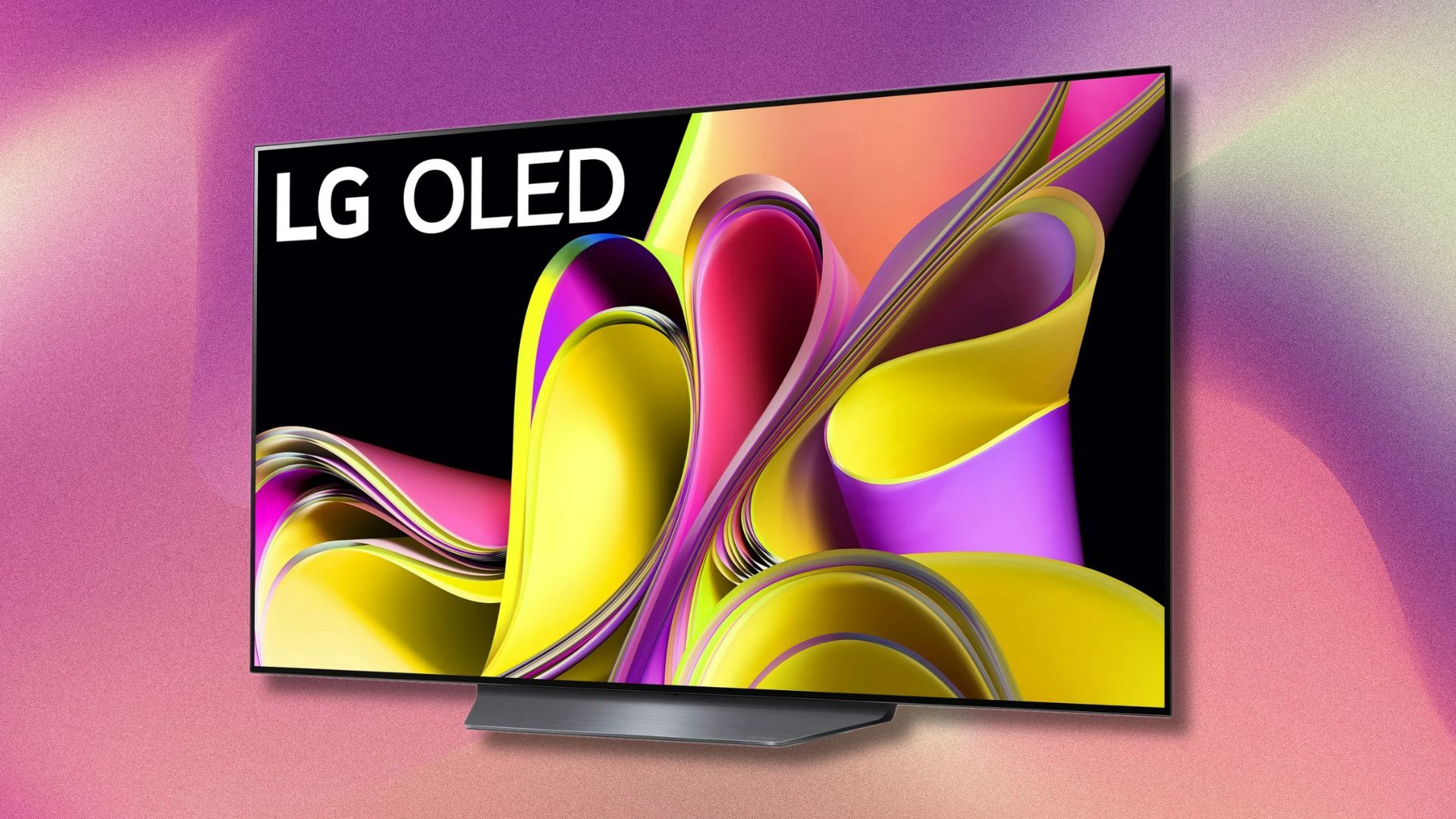 a 55-inch lg b3 oled tv at a slight angle on a purple and light pink swirling background