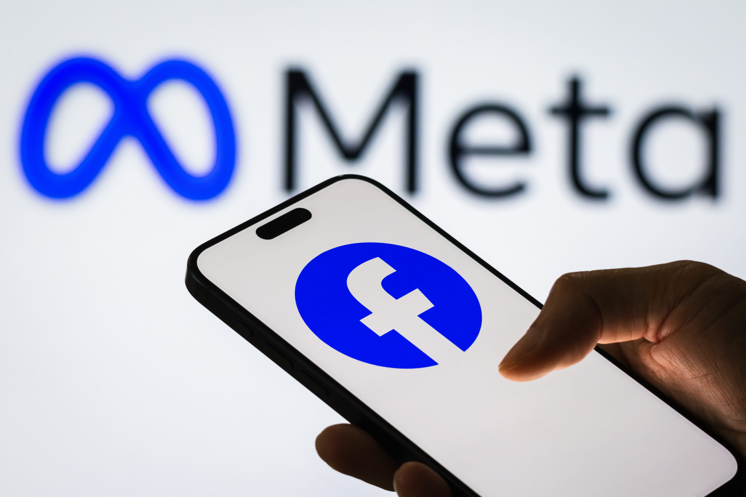 The Meta and Facebook logos
