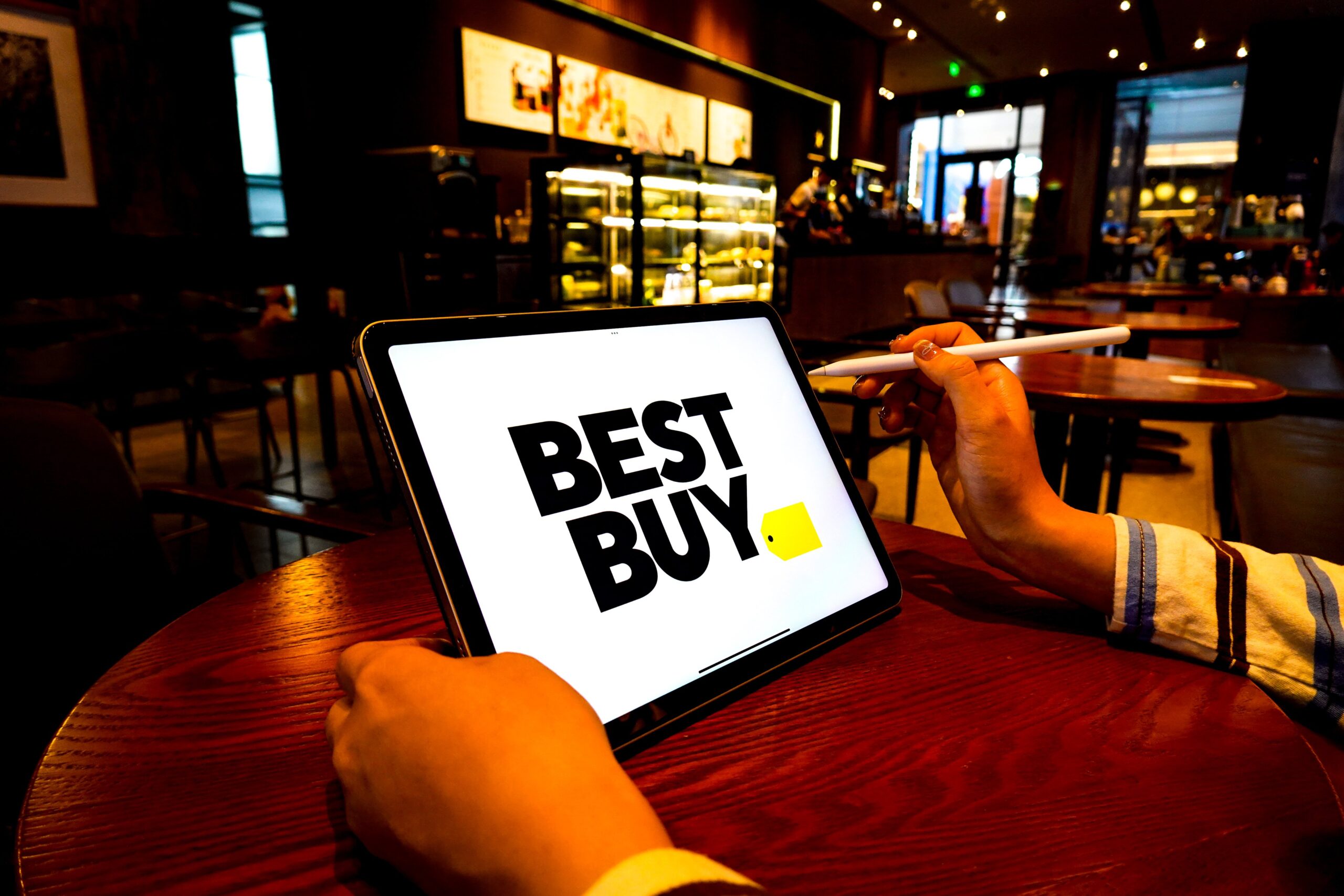  In this photo illustration, a Best Buy logo is displayed on the screen of an iPad