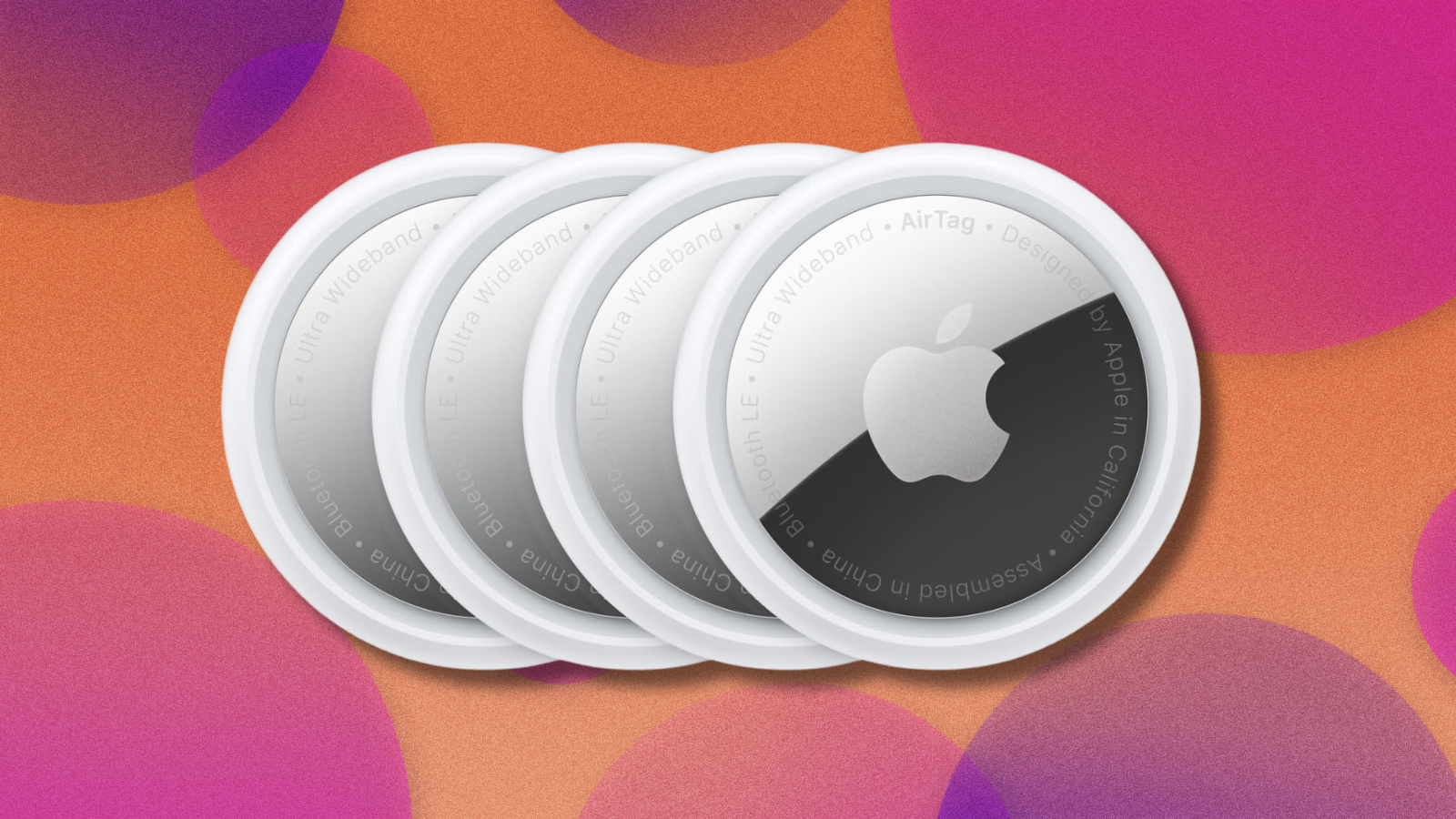 Apple AirTags on orange and purple abstract background