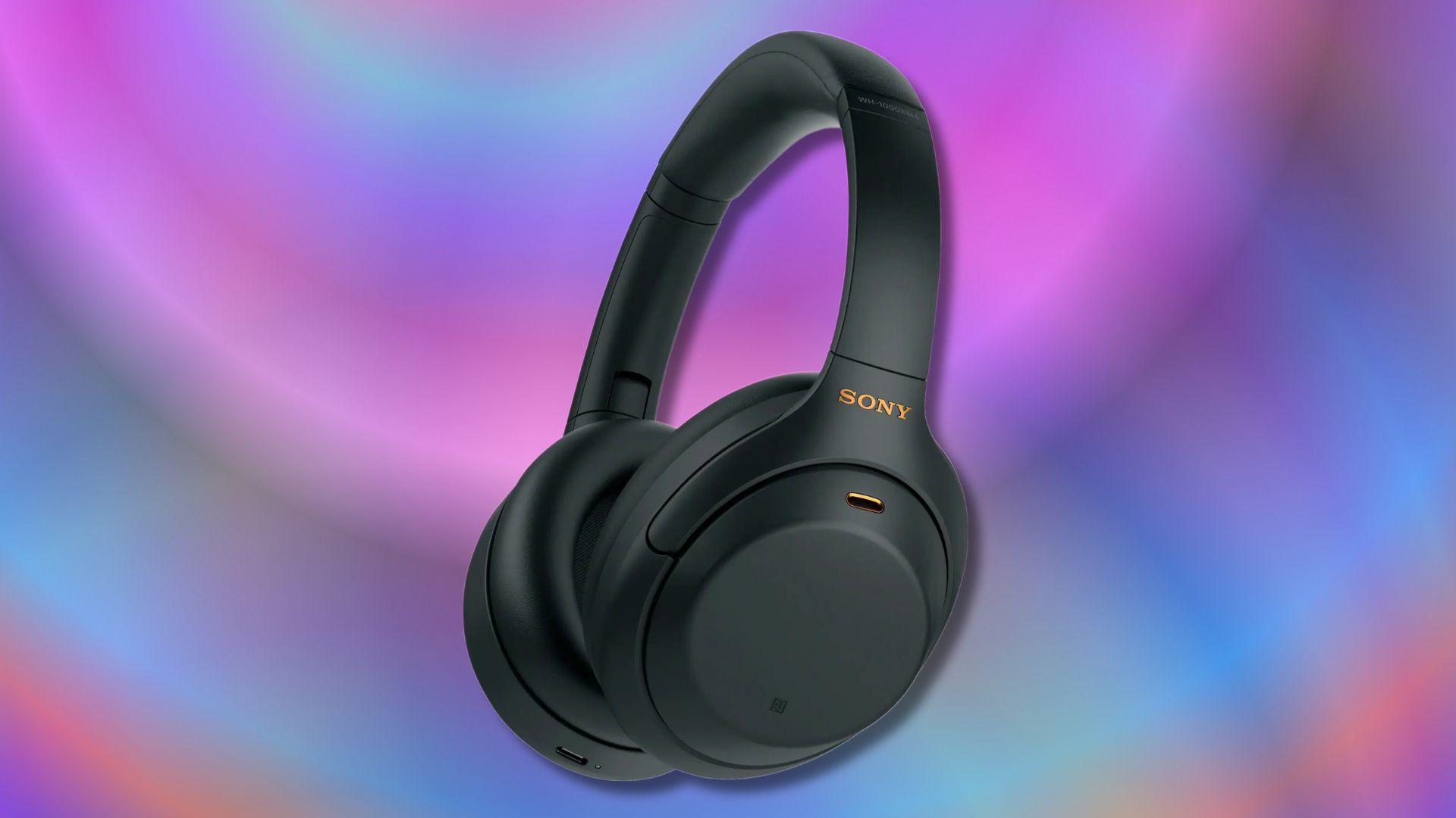 black sony wh1000xm4 wireless headphones on a purple and blue background
