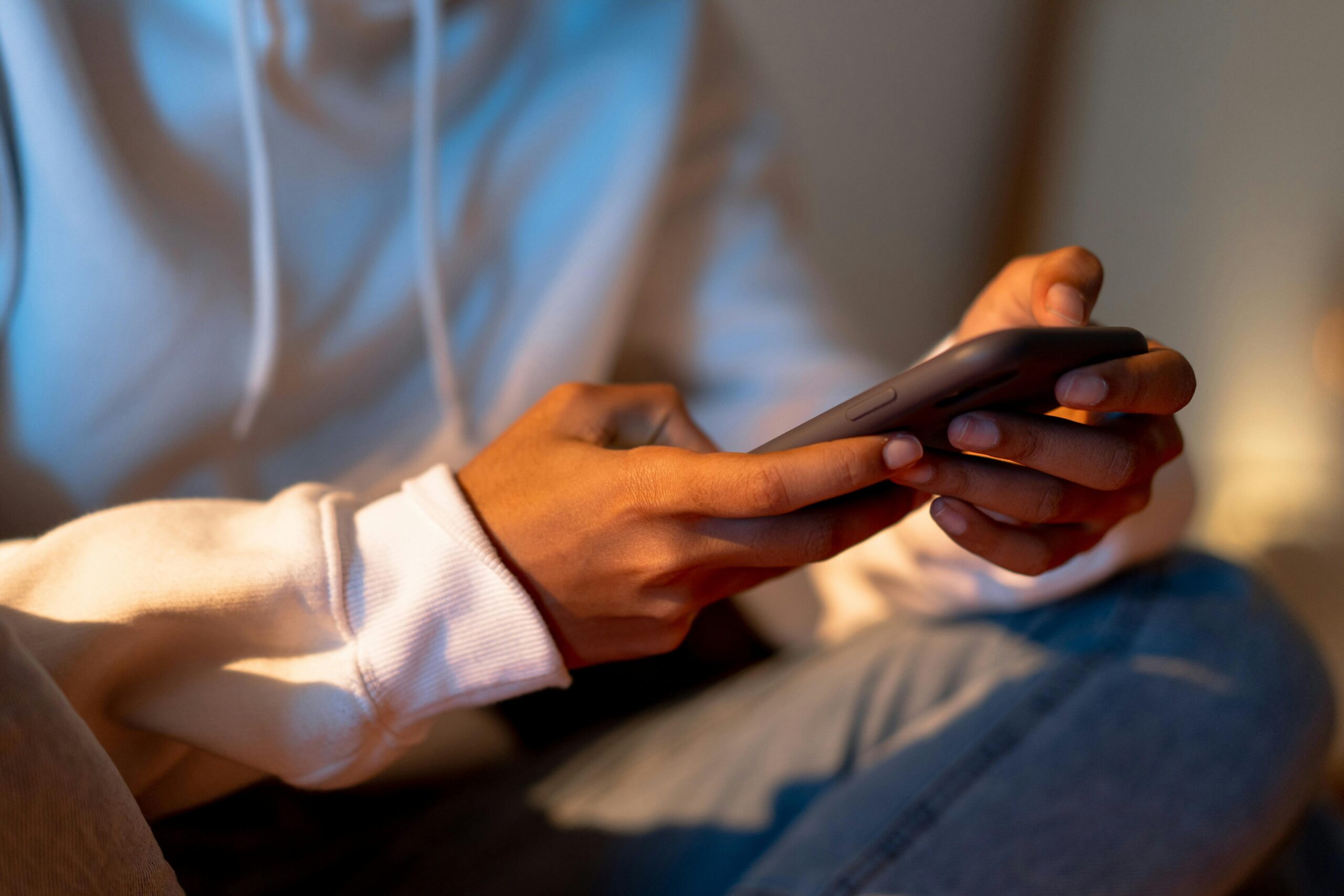 man holding smartphone